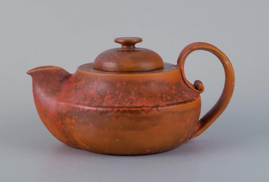 Scandinavian Modern Kähler, ceramic teapot with uranium glaze. Mid-20th century.