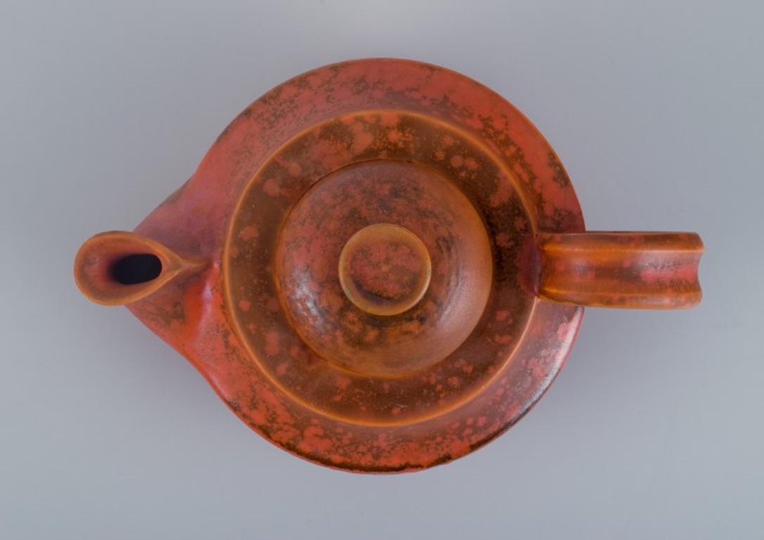 Danish Kähler, ceramic teapot with uranium glaze. Mid-20th century.