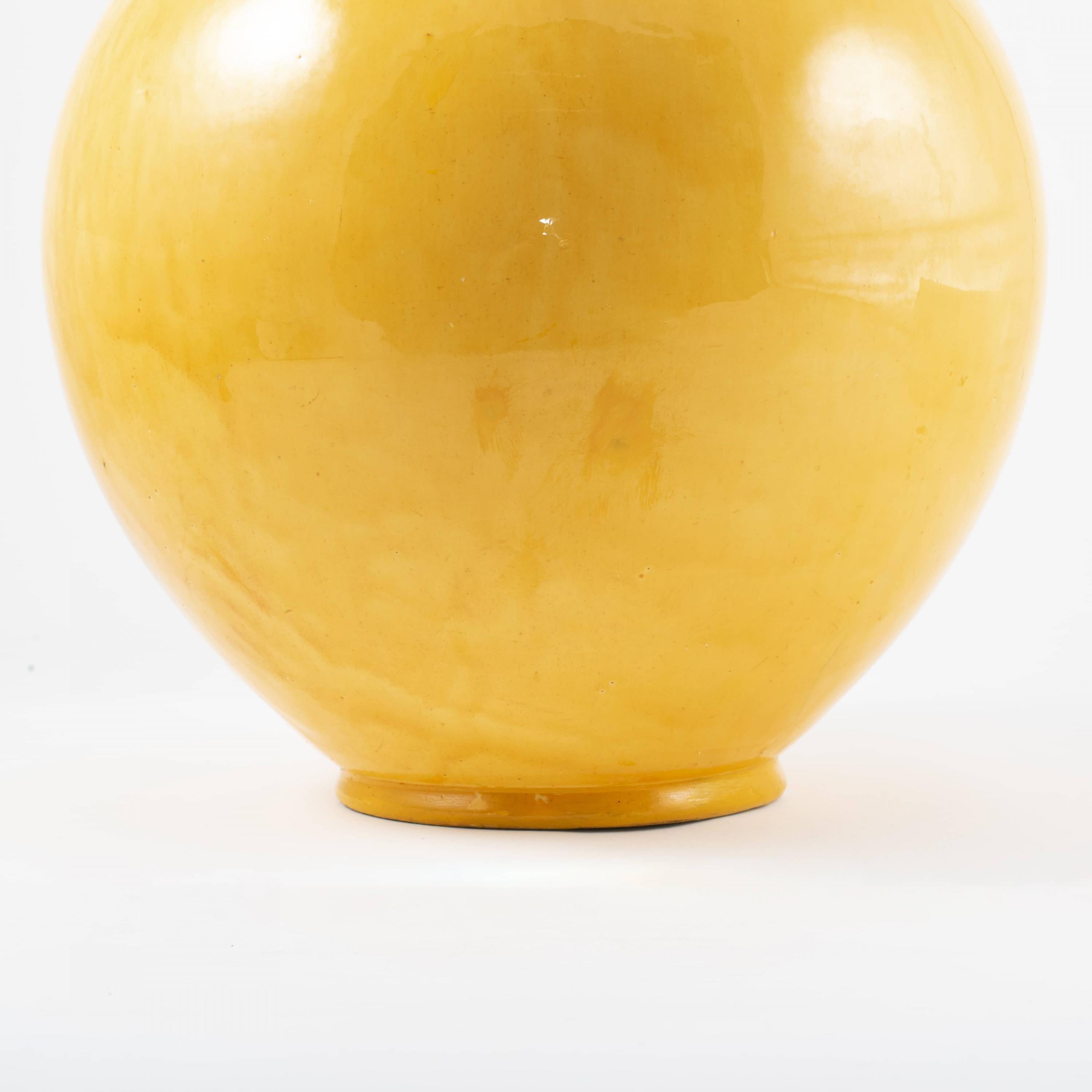 Kähler ceramic vase decorated with yellow glaze.
Signed HAK. Denmark. Herman A. Kähler.
Produced by Kähler's ceramic factory in Næstved c. 1920-1930.
    