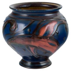 Kähler ceramic vase in cow horn technique. Glaze in blue and orange tones.