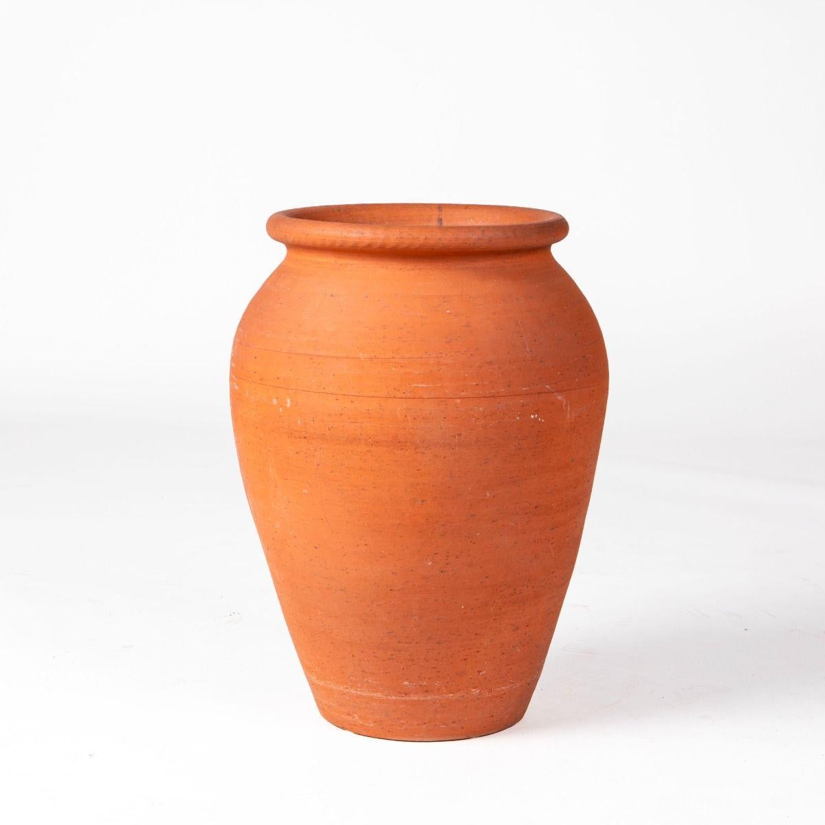 Unglazed ceramic jar by Kähler, made in Denmark around 1930. The piece is crafted from chamotte clay and has a rich, natural hue that highlights its simple and timeless form.
Height 51 cm.
Signed HAK Denmark on the underside. 
A rare example of