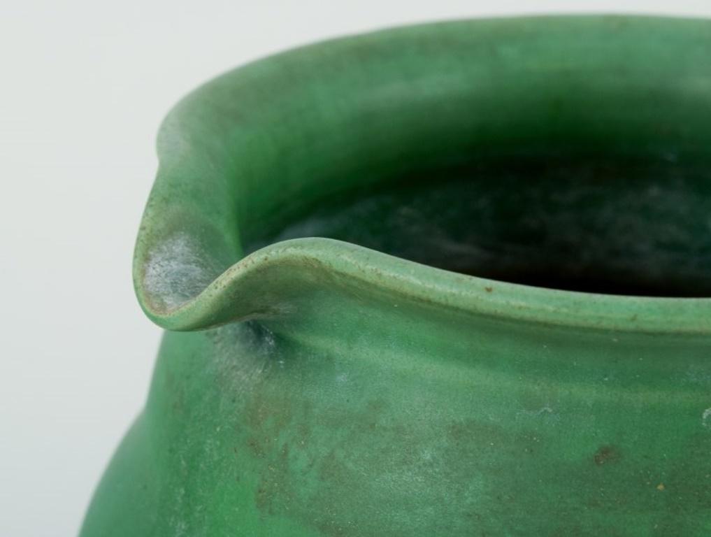 Kähler, Denmark. Ceramic pitcher. Glaze in green tones. Approx. 1930/40s. In Good Condition For Sale In Copenhagen, DK