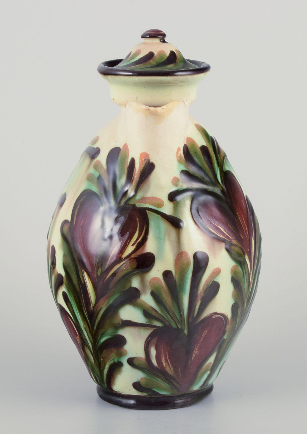 Glazed Kähler, Denmark. Chocolate jug made of ceramic decorated with polychrome glaze. For Sale