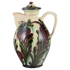Kähler, Denmark. Chocolate jug made of ceramic decorated with polychrome glaze.