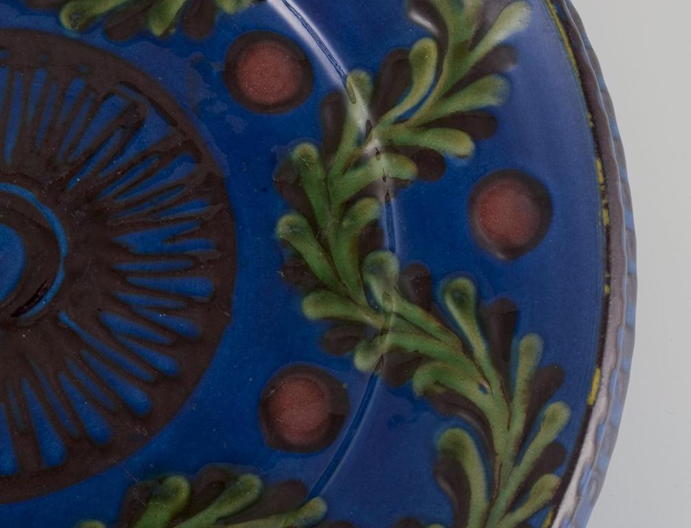 Glazed Kähler, Denmark. Large ceramic dish decorated with foliage. Ca. 1930s For Sale