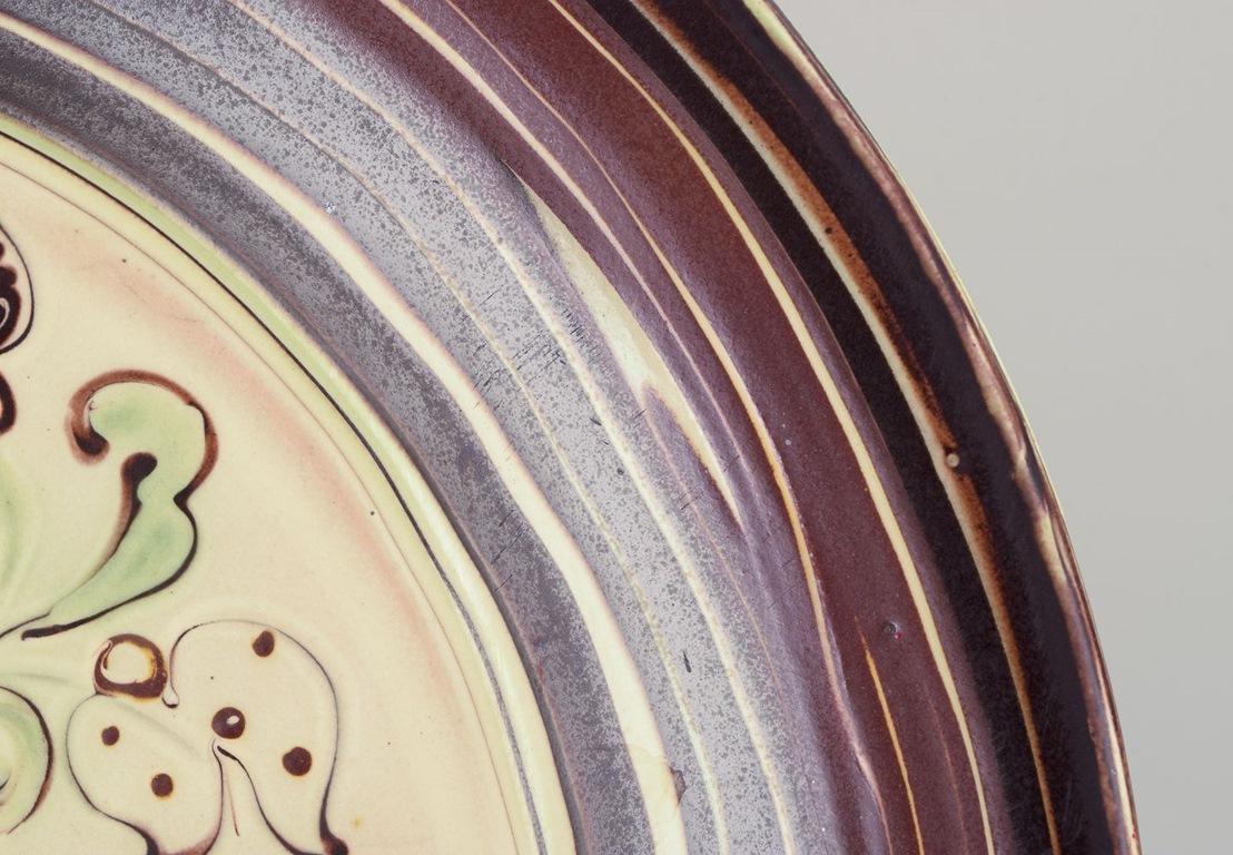 Glazed Kähler, Denmark. Large ceramic dish with motif of a dancing woman. For Sale
