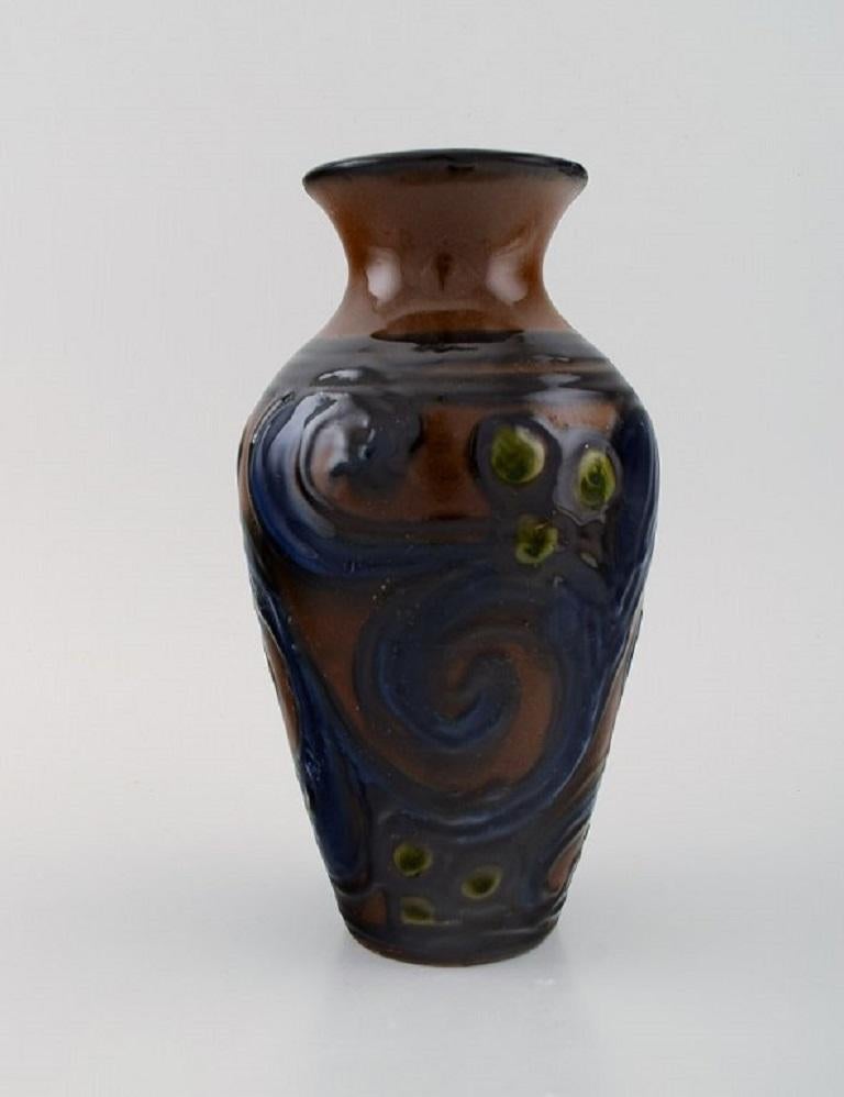 Art Deco Kähler, Denmark, Vase in Glazed Stoneware, Blue Foliage on a Brown Background For Sale