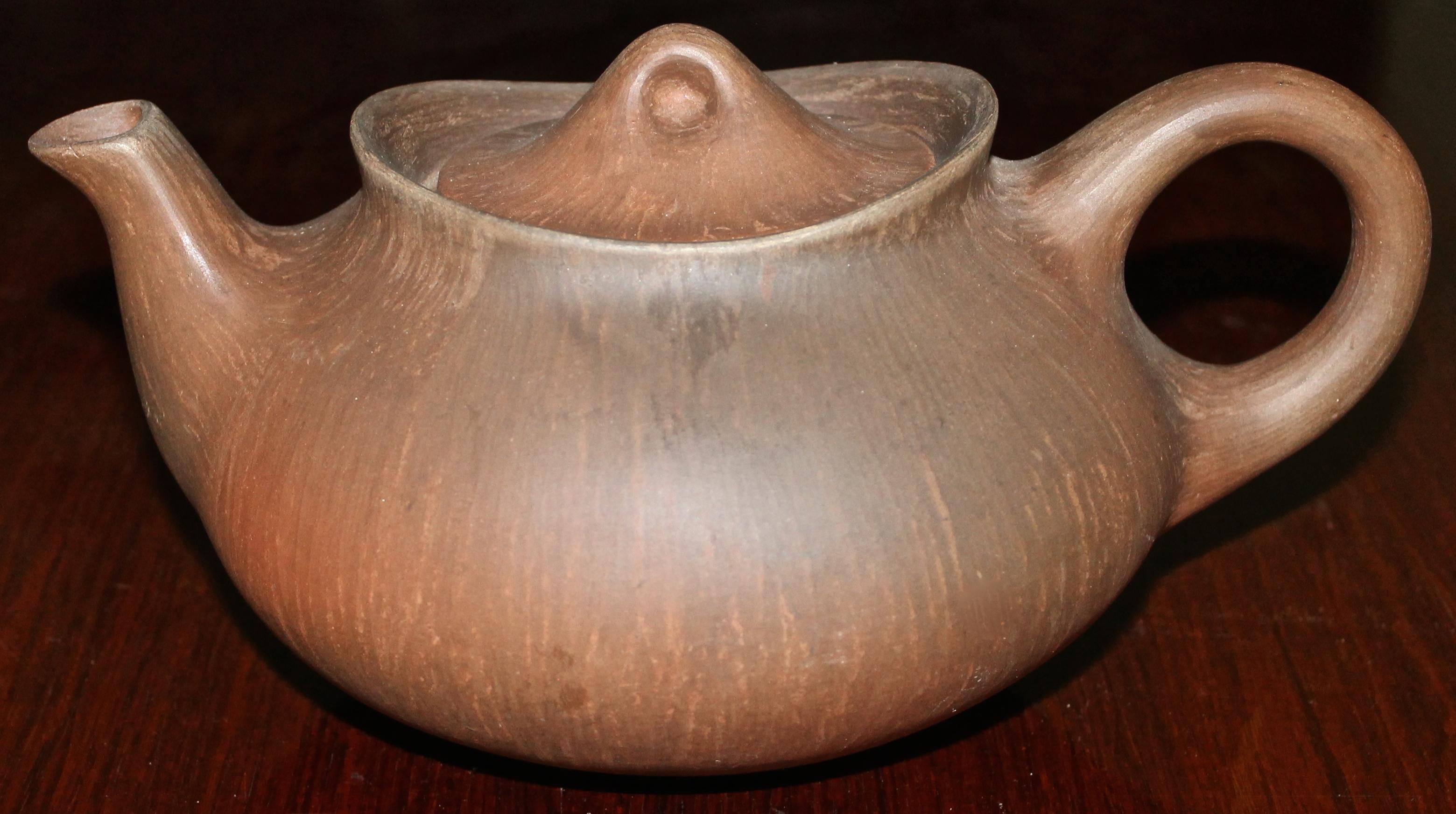 Beautiful handmade teapot. Incised signature on bottom: with the Kahler K and Danmark.