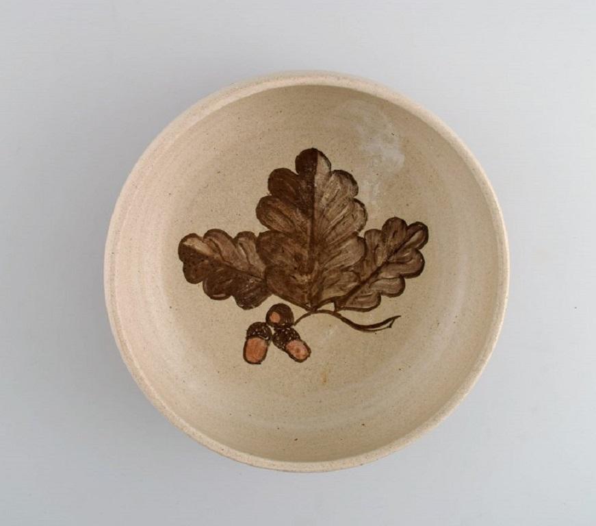 Danish Kähler, HAK. Glazed ceramic bowl with hand-painted leaves and acorns. 1960s. For Sale