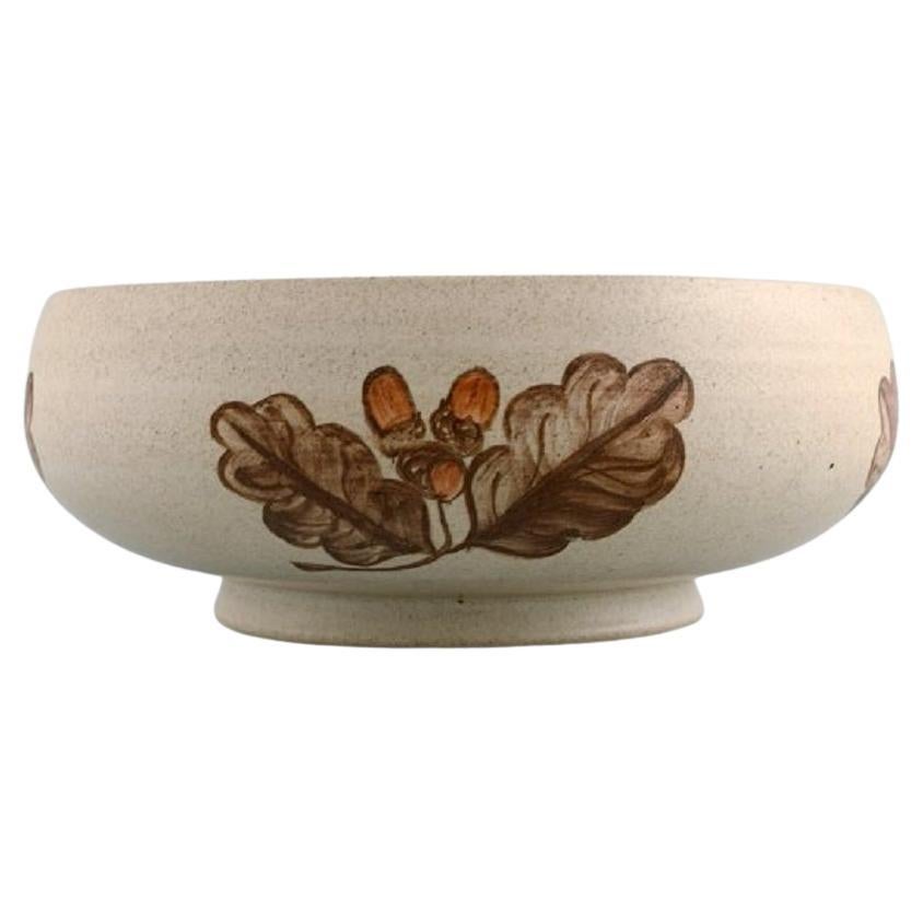 Kähler, HAK. Glazed ceramic bowl with hand-painted leaves and acorns. 1960s. For Sale