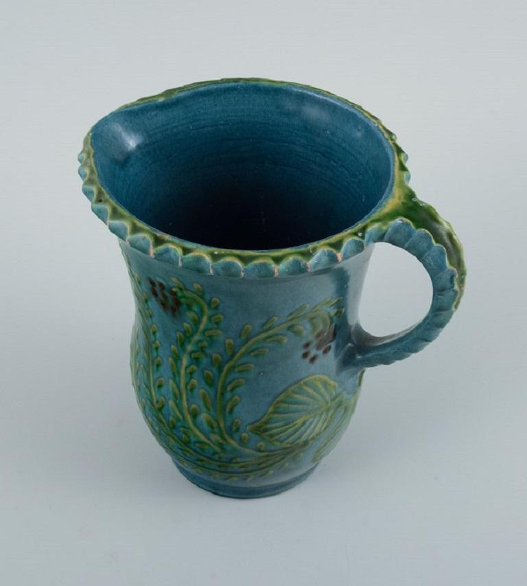 Art Deco Kähler Jug in Glazed Ceramic, Decorated with Flowers on a Blue Background