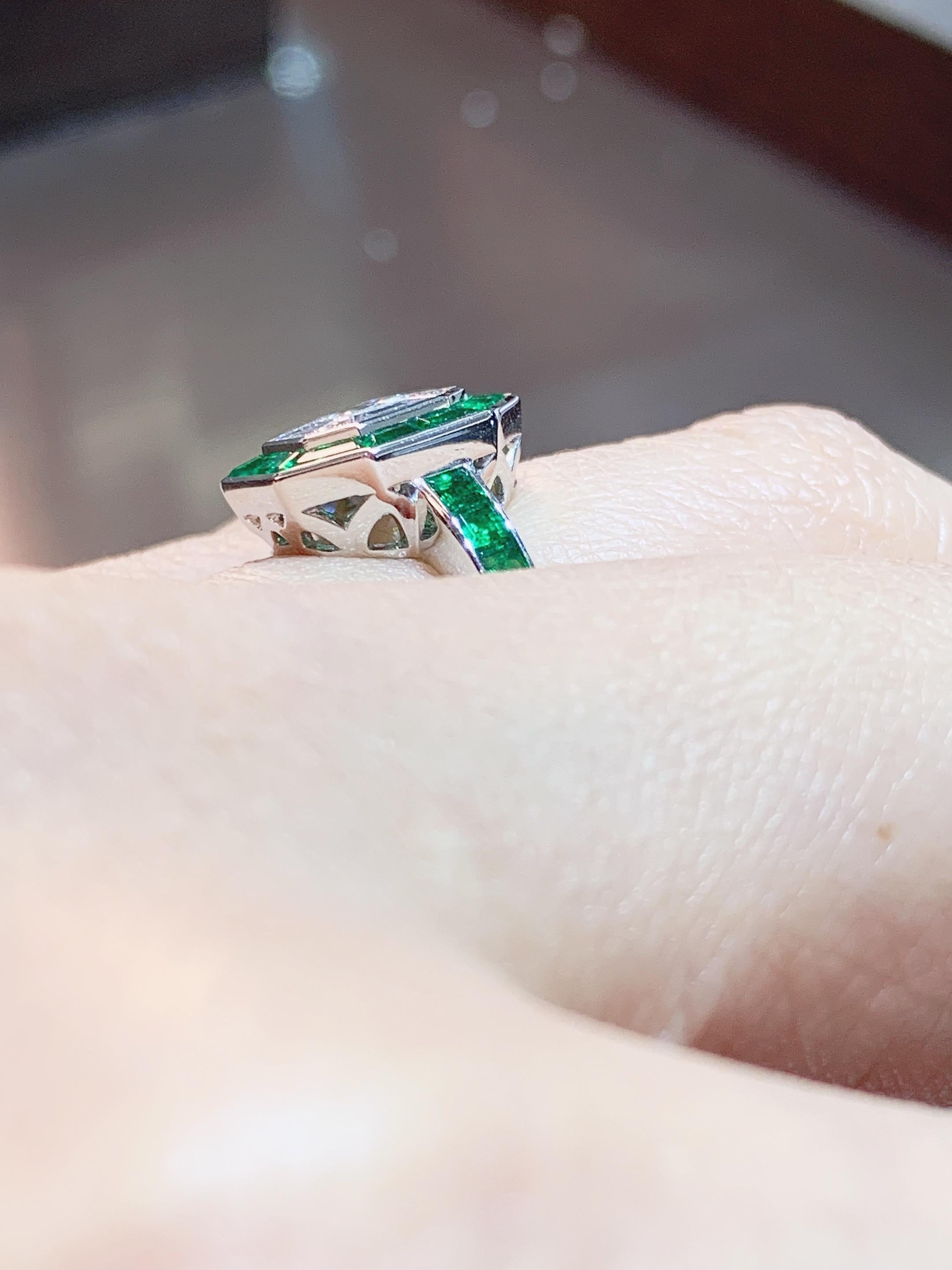 Contemporary 18 Karat Gold White Diamond Ring with Emerald Halo For Sale