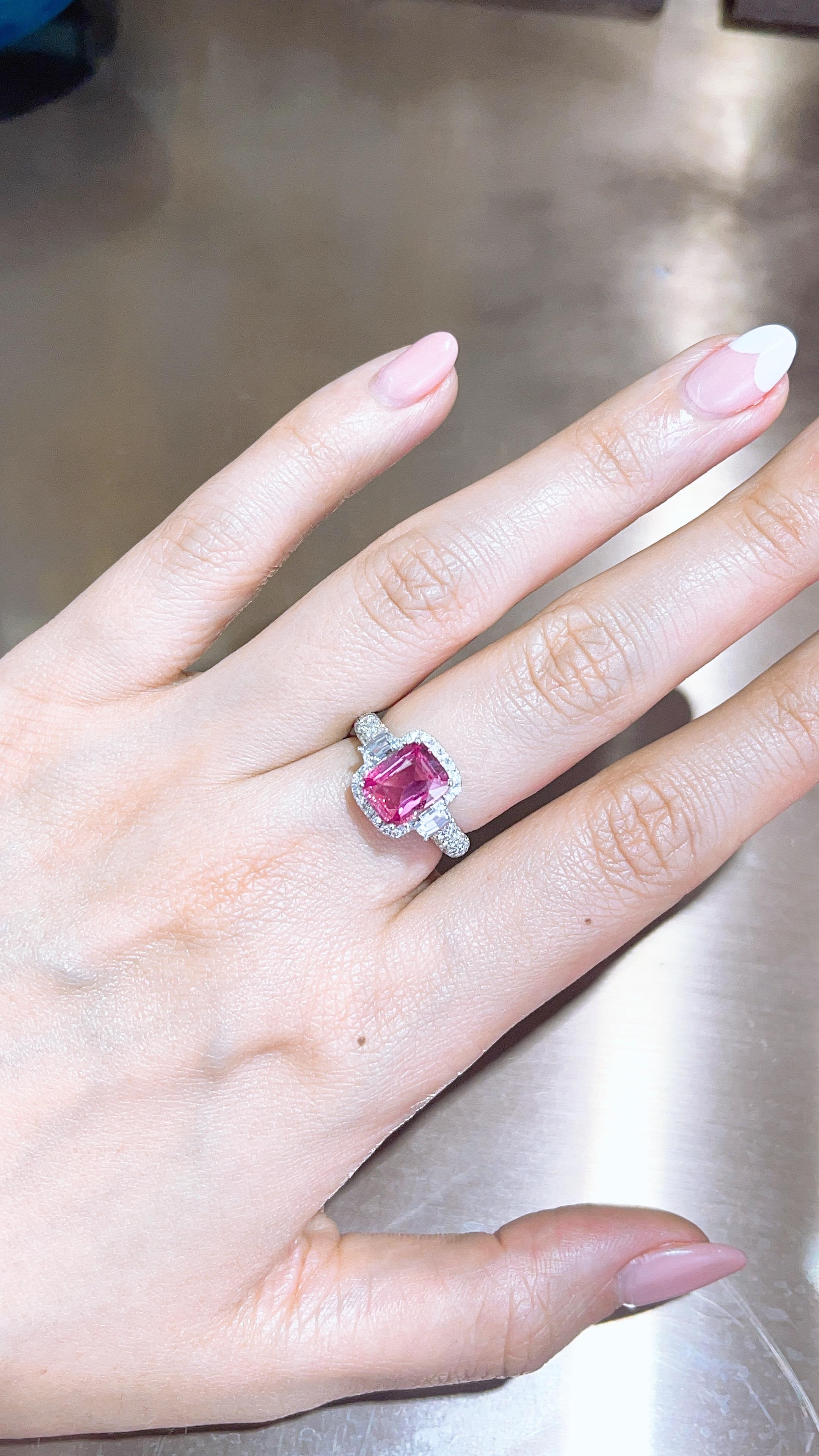This ring present a 2.64 carat unheated emerald cut  Purple - Pink sapphire set with 2 white diamond on 2 side,  finished in 18K white gold  White diamond on the side total 0.65 ct, and others white diamond 1.27ct . 

The stone is absolutely clean