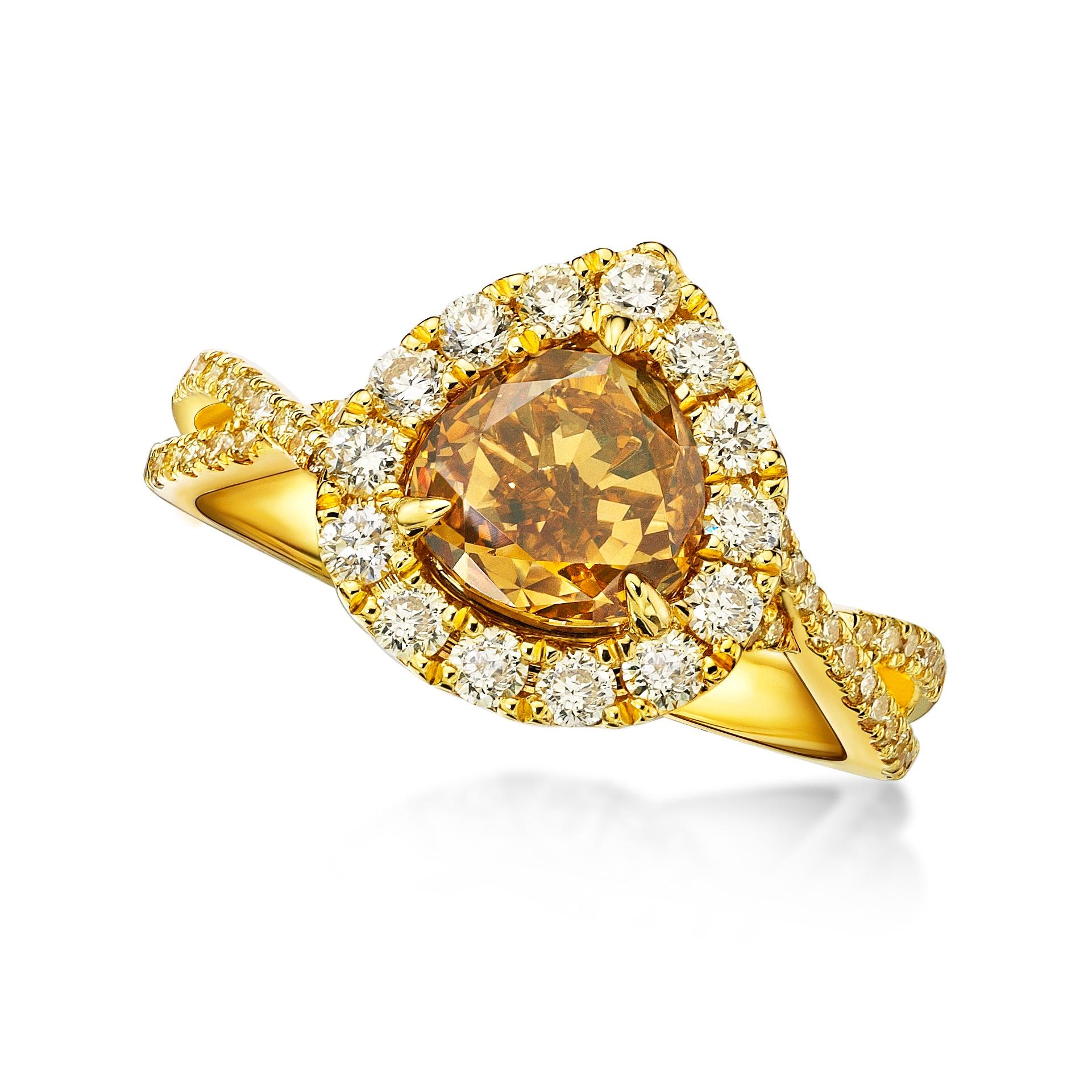 Featuring a  1.74 carat modified heart shape Fancy Deep brownish yellow Diamond Ring  , with yellow diamond halo. Finished in yellow  gold. 

Center stone certified by world wide known GIA institution. (7161398683) 

Ring size- US 6.5,  Kahn also