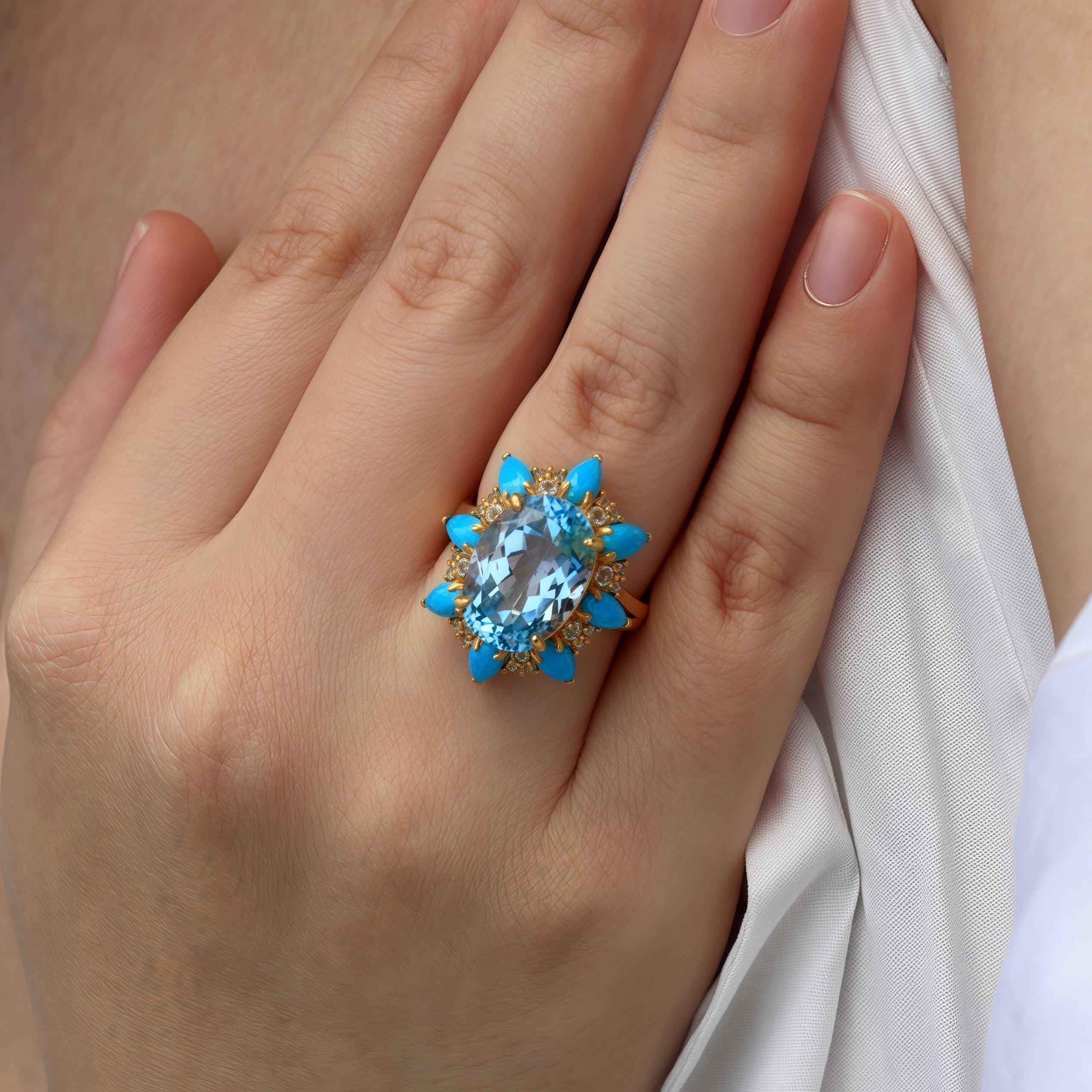 Discover Kai's Blue Topaz Turquoise Aquamarine Cocktail Ring, a radiant masterpiece in 14k yellow gold that combines the brilliance of blue topaz, the tranquil beauty of aquamarine, and the striking vibrancy of turquoise in one exquisite piece. The