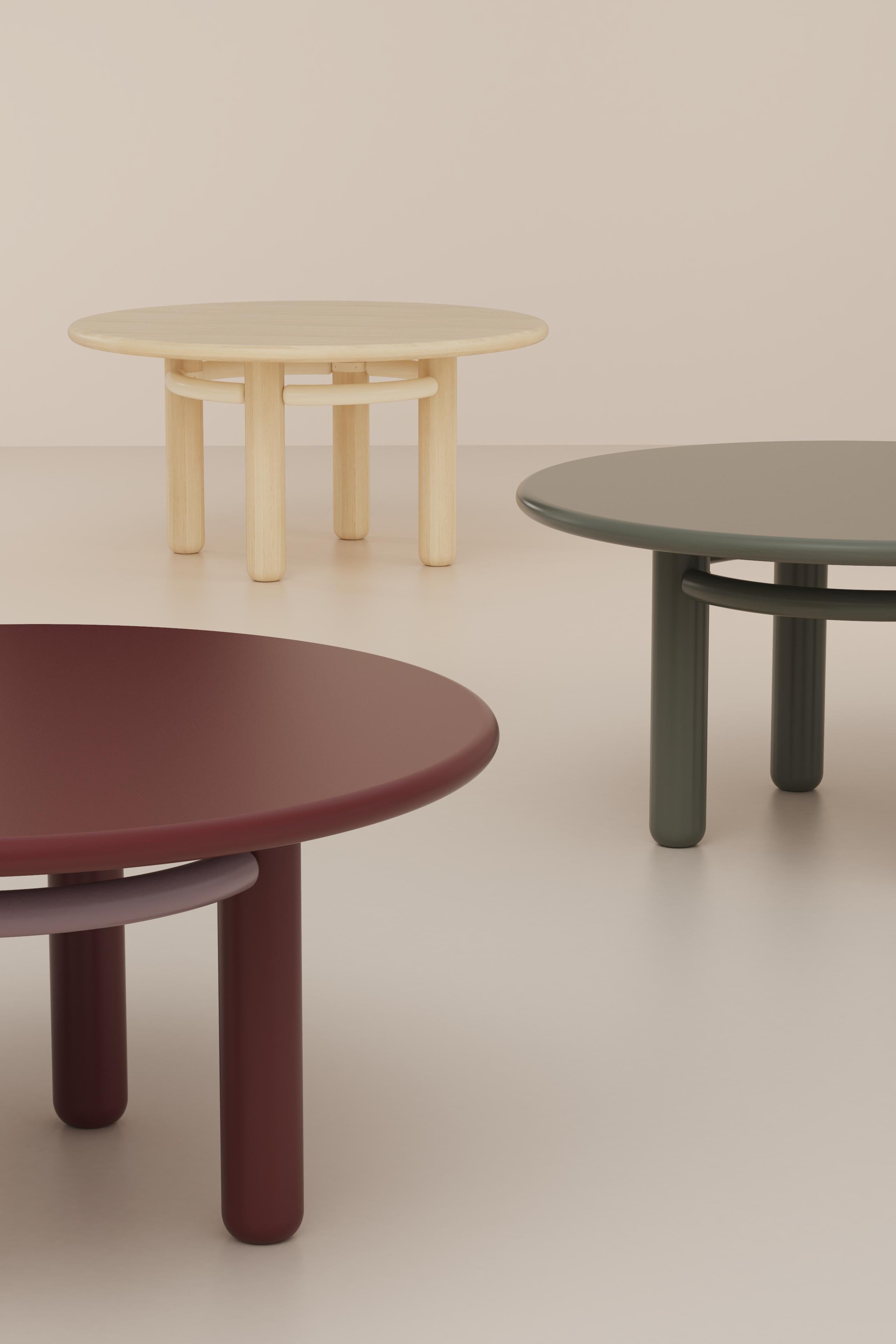 KAI dinner table with lacquered wood feet, oak wood top and steel structure.
Measure : 150cm diameter. 
The feet, the structure and the top are available in a selection of curated materials and finishings from our collection. Completely
