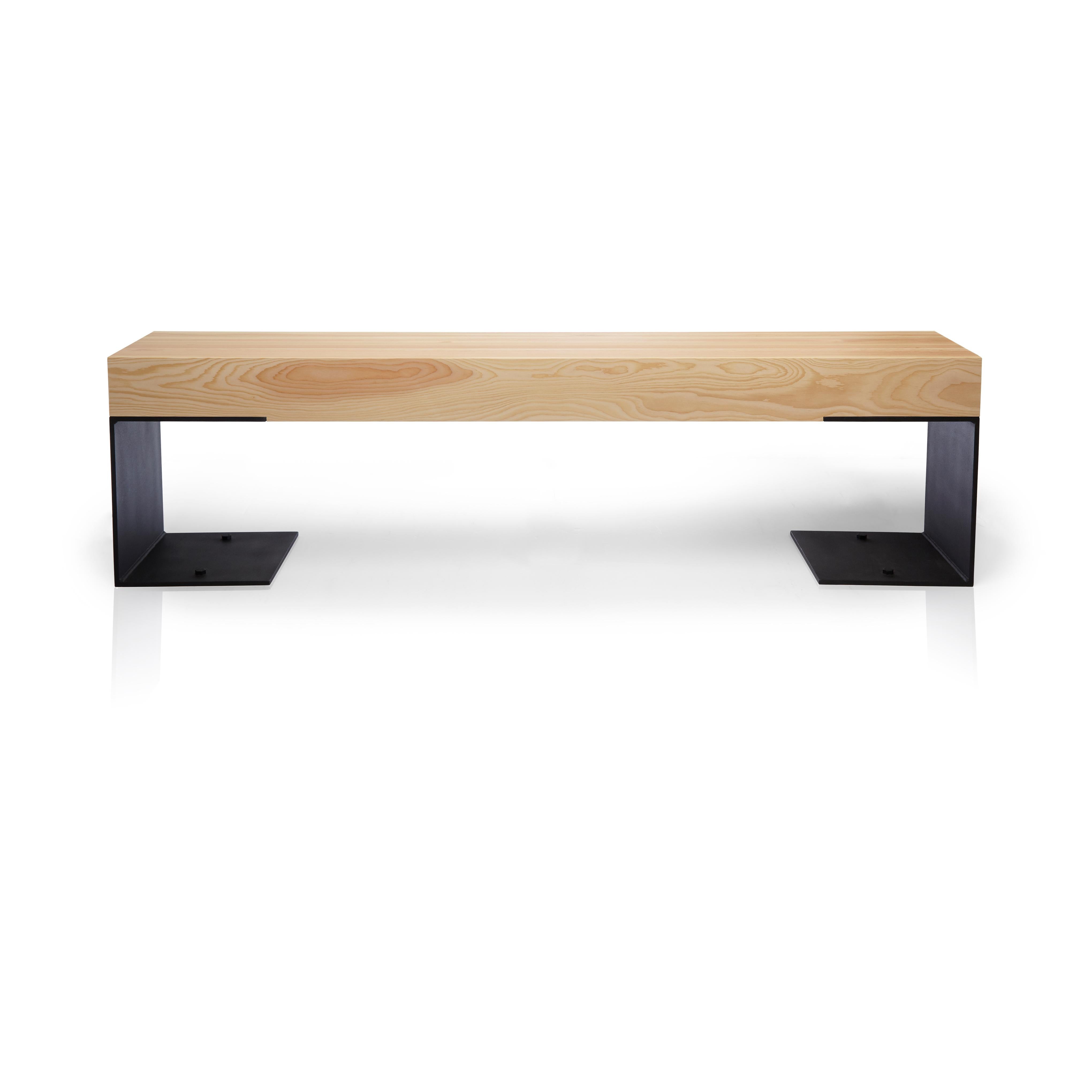 Modern industrial. The Kai Hallway bench is all about proportions, balancing the width of the steel legs and the thickness of the bench seat. It provides a modern industrial look using Douglas Fir lamination's set on black steel legs. Designed by
