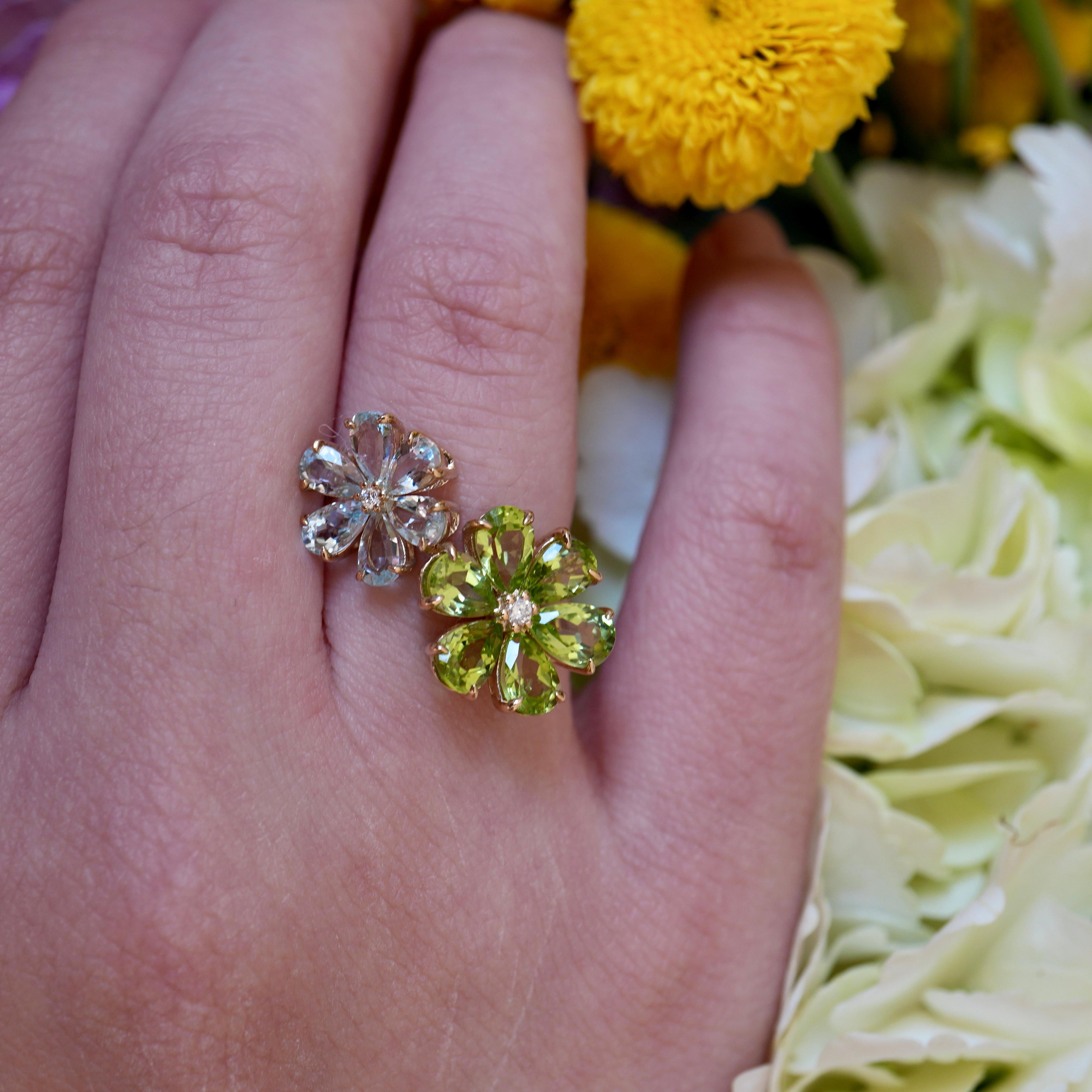 Flora 14K Solid Gold Peridot and Aquamarine Cocktail Ring is a radiant embodiment of nature’s beauty and timeless elegance. This exquisite design showcases a harmonious blend of vibrant green peridot and serene sky-blue aquamarine gemstones, each