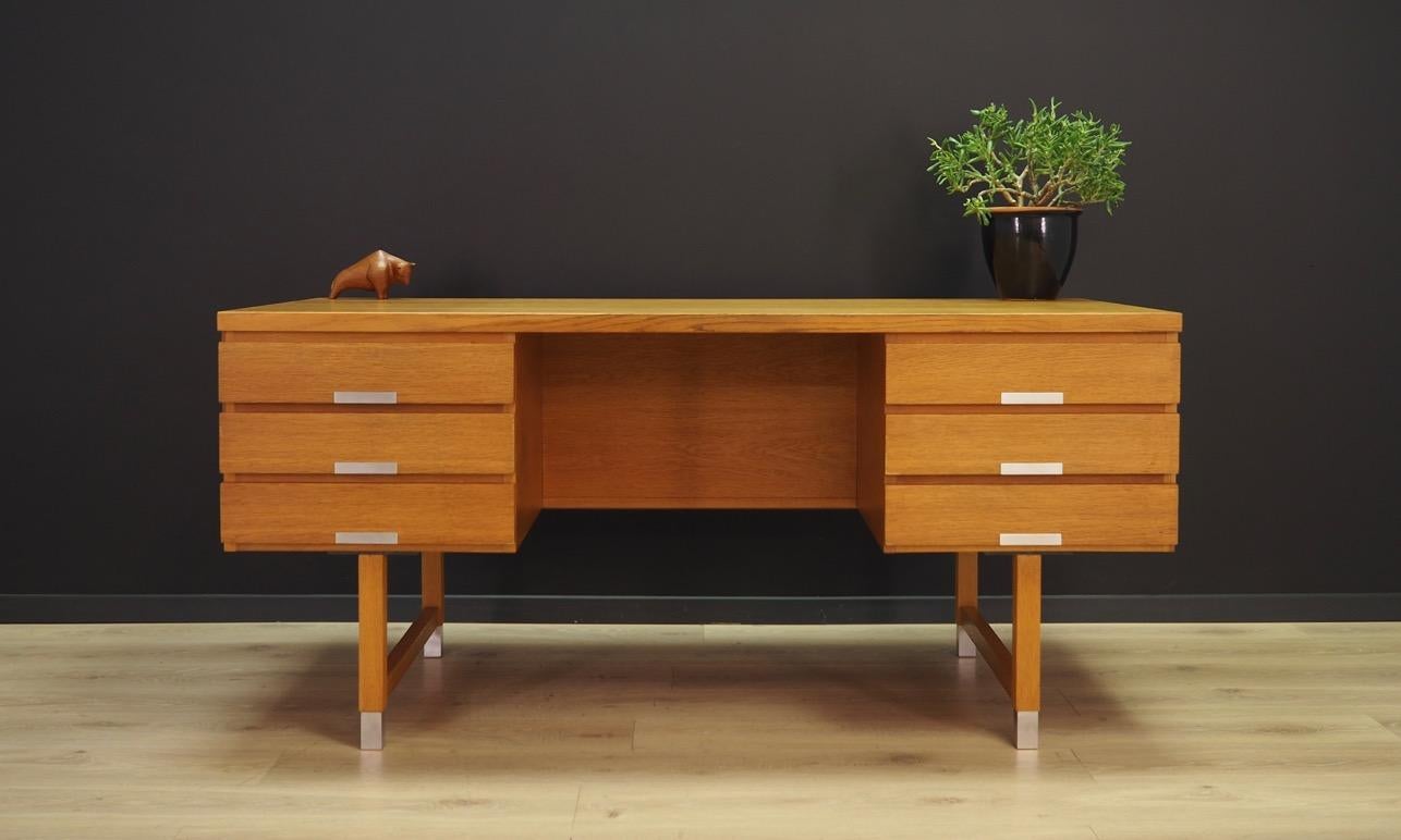 Unique desk from the 1960s-1970s. Design by prominent Danish designer Kai Kristiansen. The surface of the furniture is finished with ash veneer, legs are made of solid ashwood. The desk has six practical drawers with brilliant metal handles, shelves