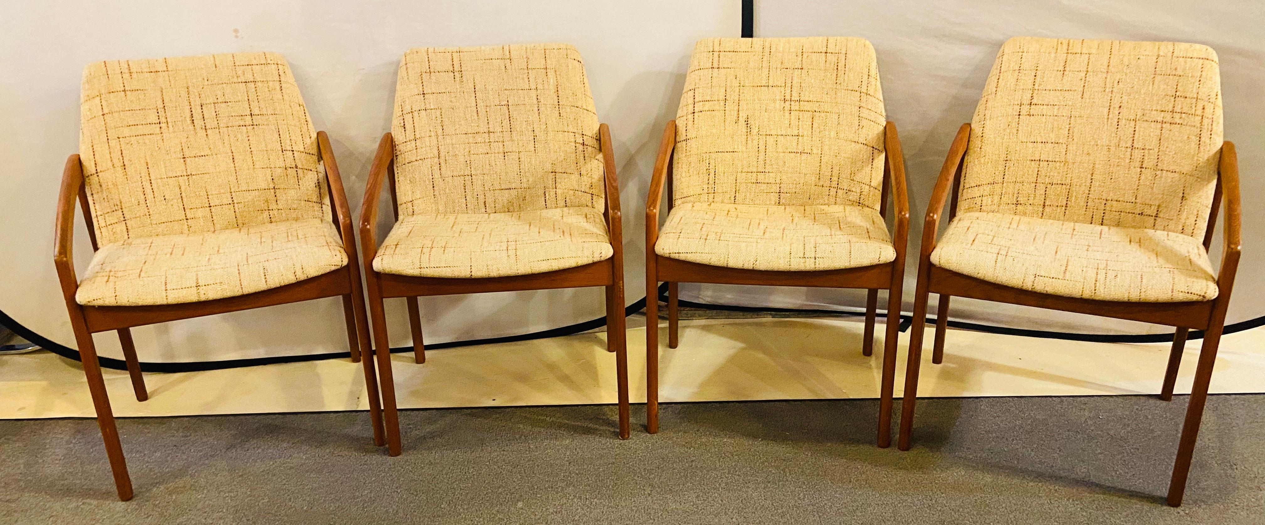 1950s Mid-Century Modern Danish teak dining or side chairs, set of four
This exquisite set features a solid and sculptural teak frame. The upholstery is in good condition.
The sleek and timeless Danish Mid-Century Modern design with down swept