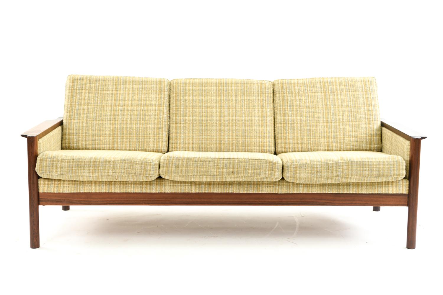 A mid-century Danish 3-seat sofa designed by Kai Kristiansen. Featuring a rosewood frame.