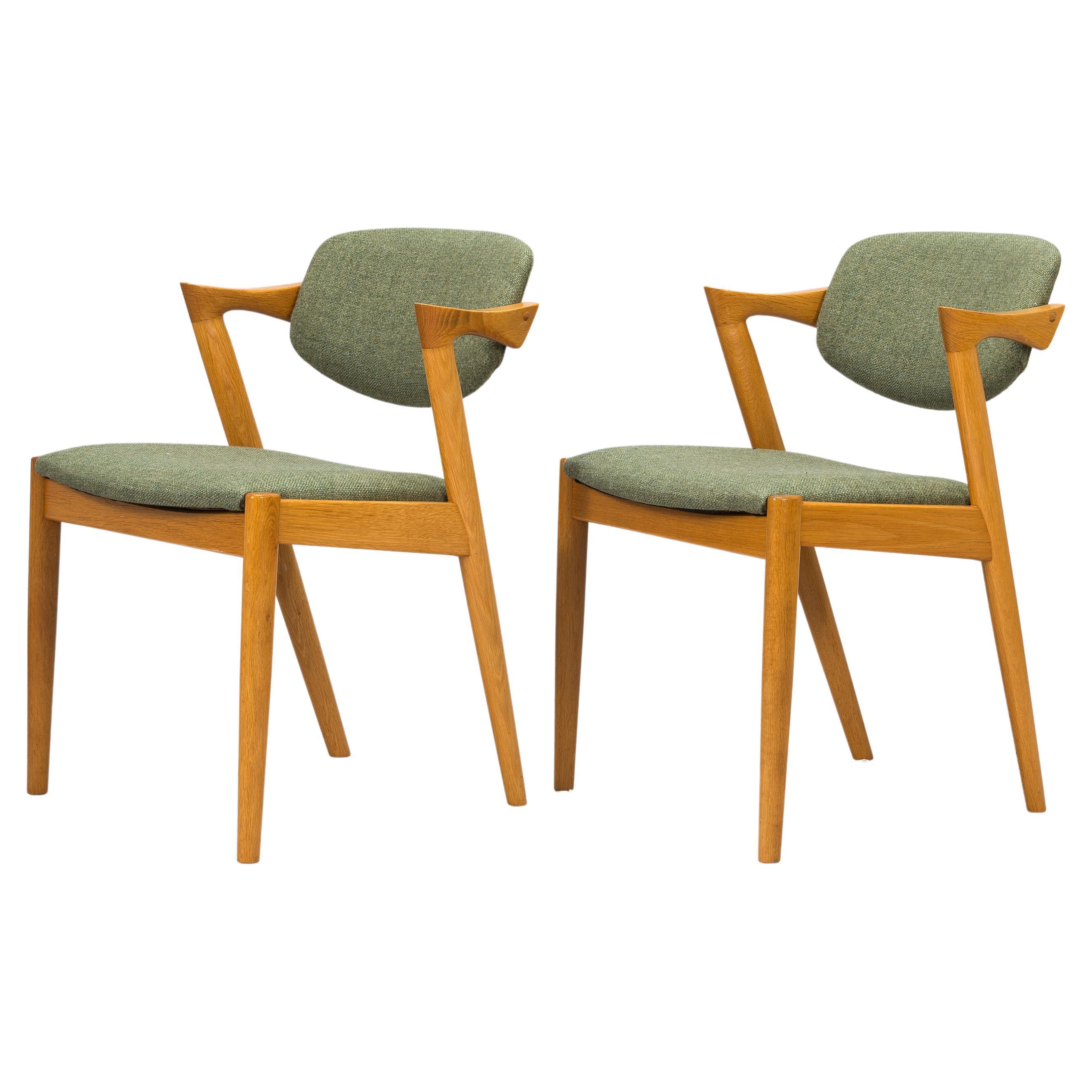 Kai Kristiansen, A set of four 'Z-chair' chairs, Denmark, 1960s.

The seat and backrest are upholstered with green fabric. Seat height 46 cm, height 75 cm.

