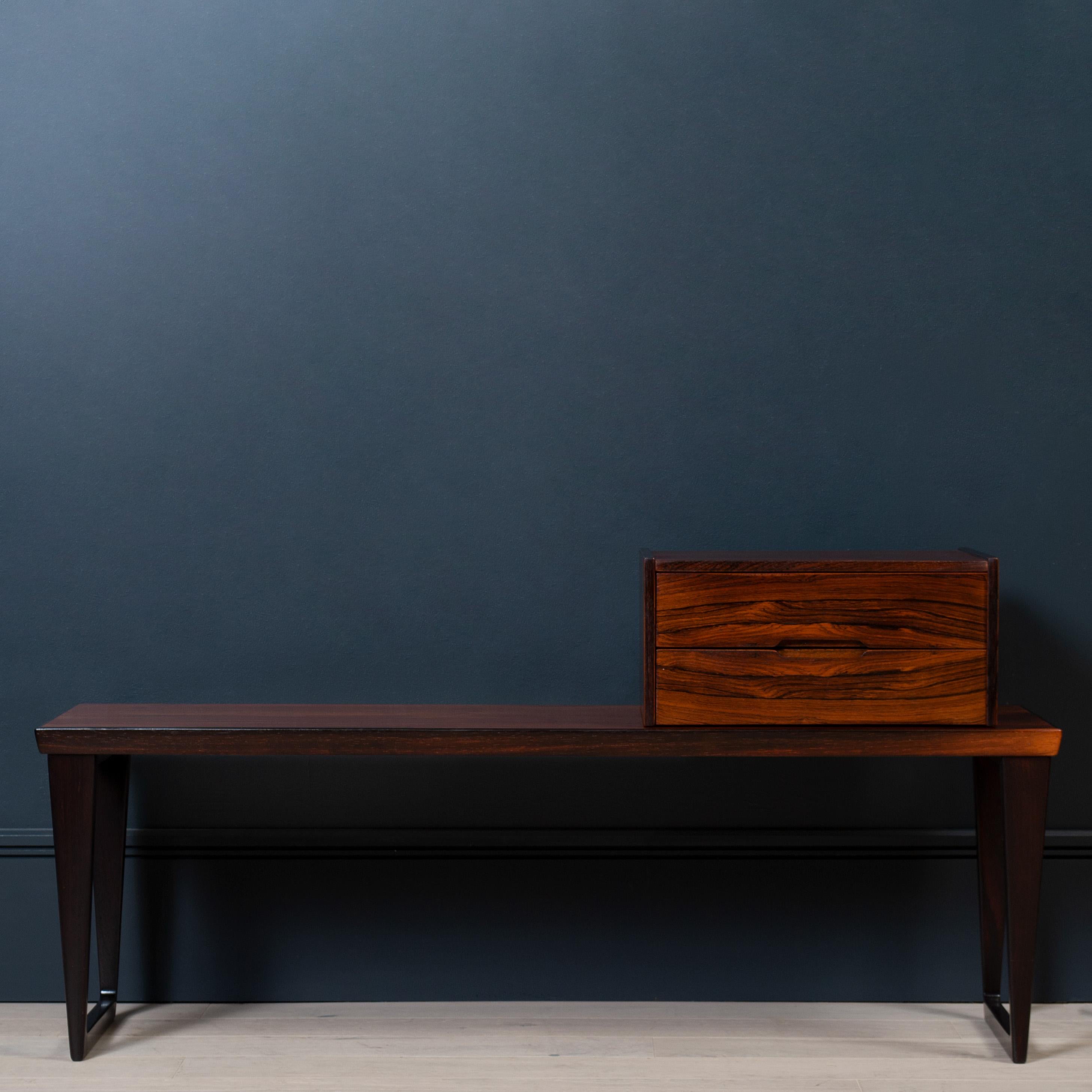 Superb bench and box set by Aksel Kjersgaard, Odder furniture manufacturers and designed by Kai Kristiansen circa 1960, Denmark.
This model 36 bench with box drawers was originally designed as a hall entry set but today is utilised in many other