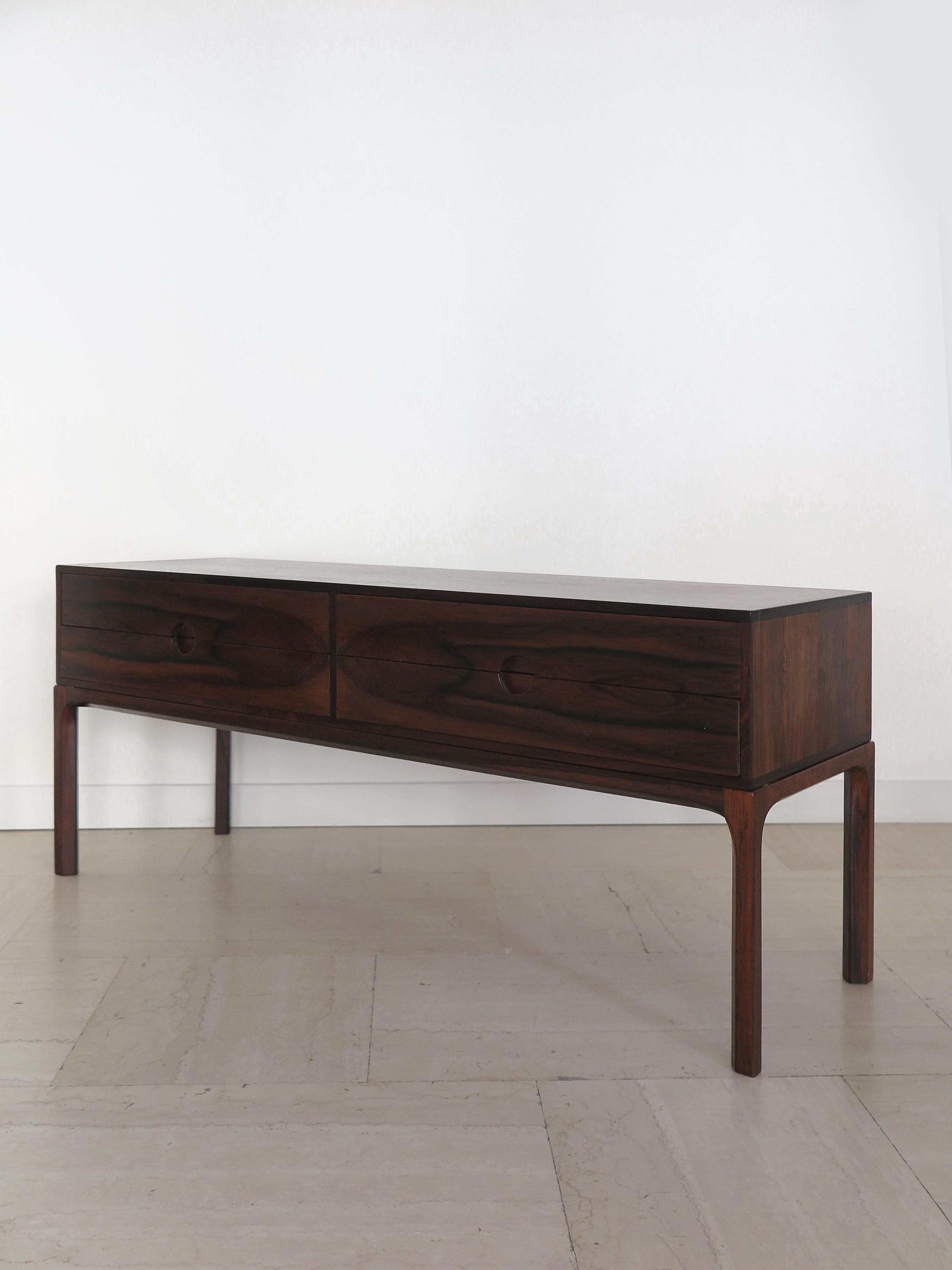 Scandinavian midcdentury rosewood double drawer with four drawers  or low sideboard model 394 design by Kai Kristiansen and produced by Aksel Kjersgaard Odder, faded stamp on the back , production Denmark 1960s 

Please note that the item is