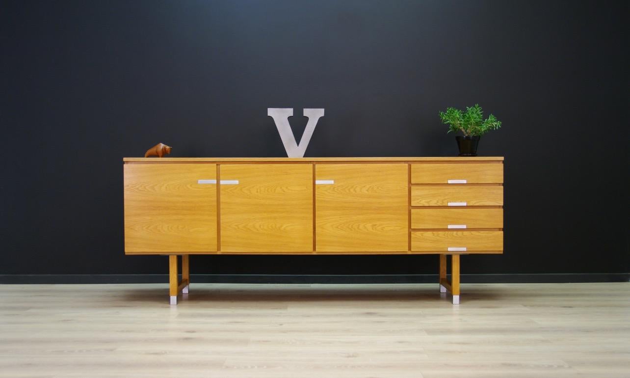 Unique sideboard from the 1960s-1970s, Minimalist form - Danish design designed by Kai Kristiansen. All veneered with ash. Wonderful aluminum handles. Four capacious drawers and three shelves in the interior. Preserved in good condition (small