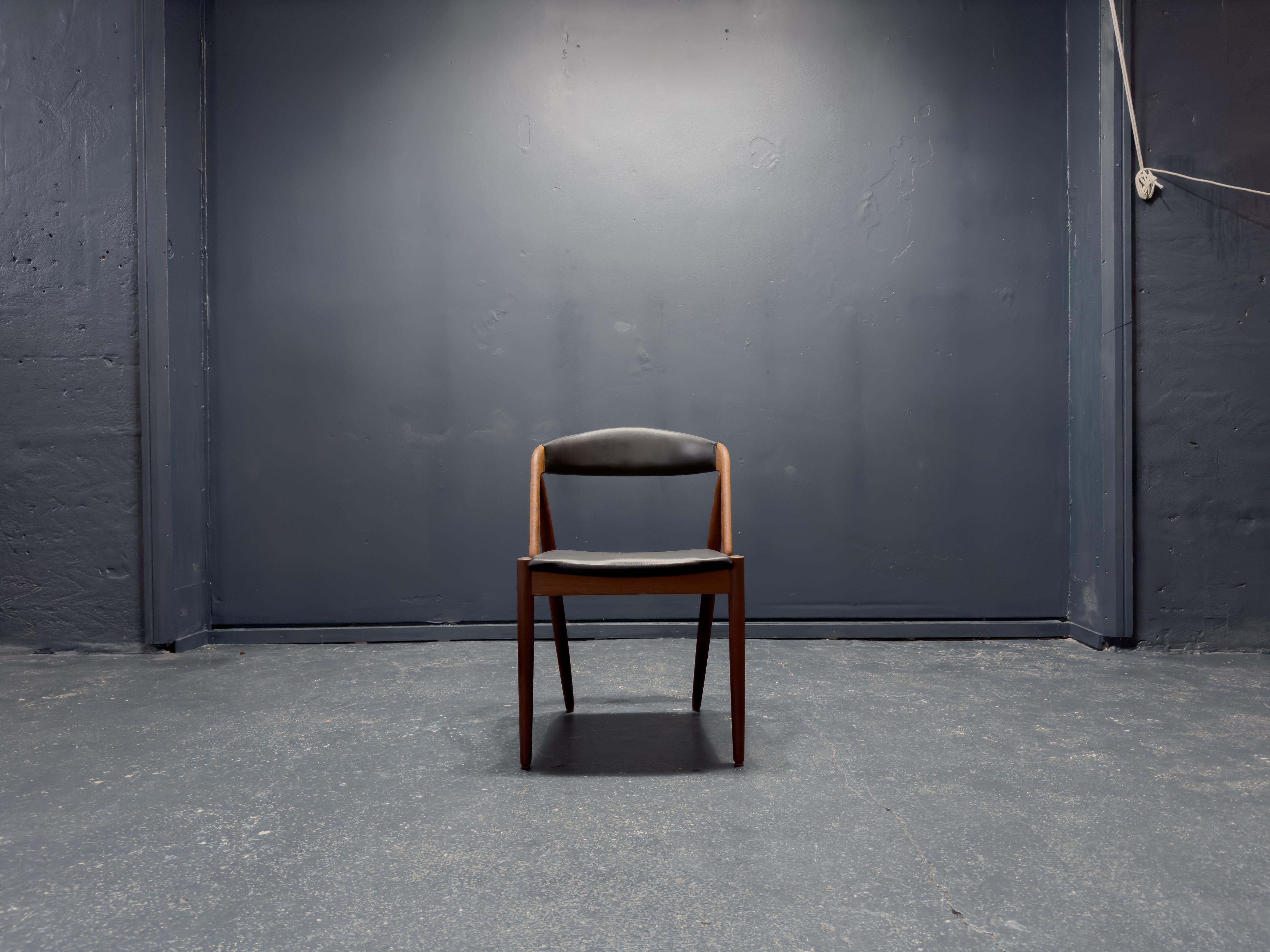 Mid-Century Modern Kai Kristiansen Black Leather and Teak Model 31 Chair For Sale