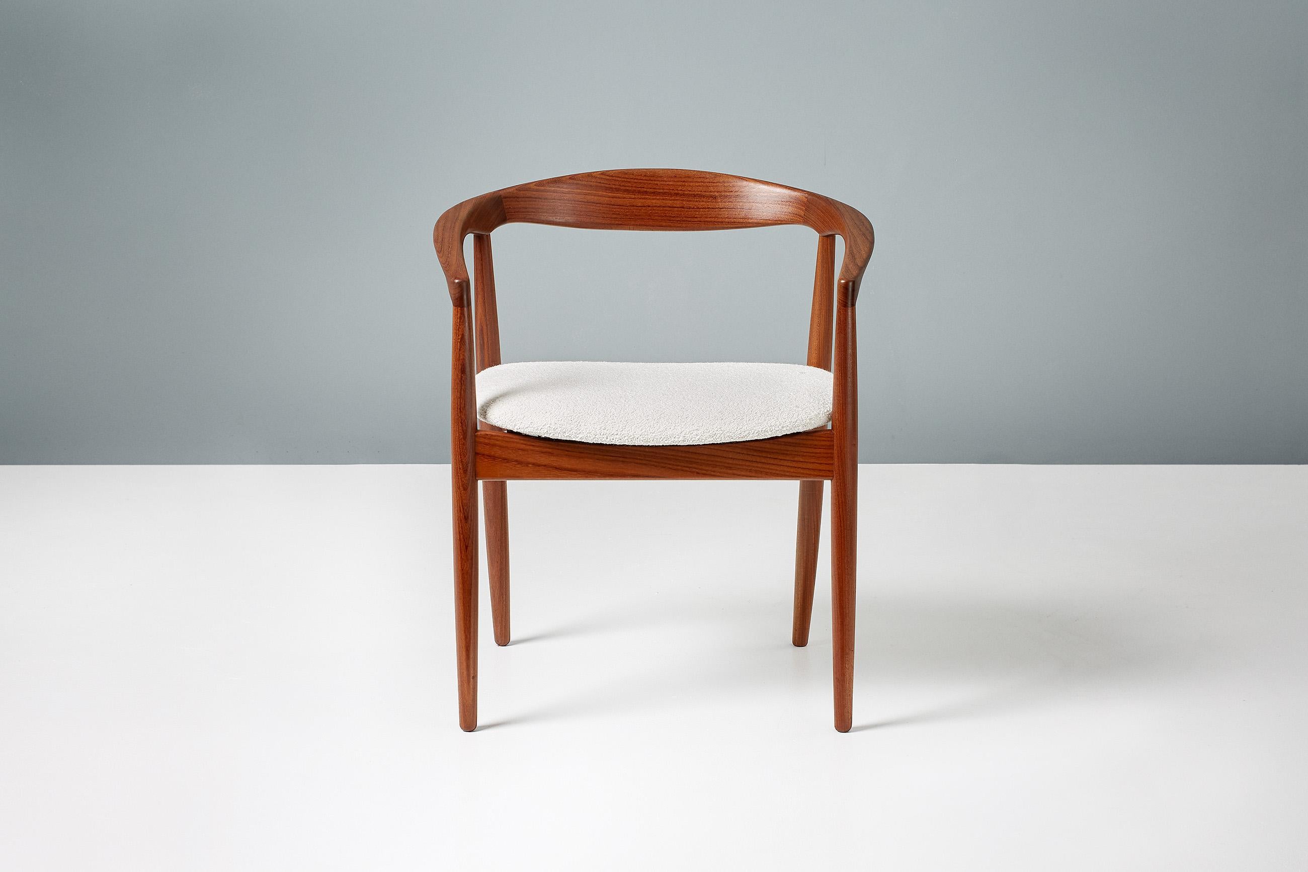 Kai Kristiansen 'Troja' round chair from circa 1960. The frame is made from Afromosia African teak wood. The seat has been reupholstered in premium cotton-wool blend ivory boucle fabric.