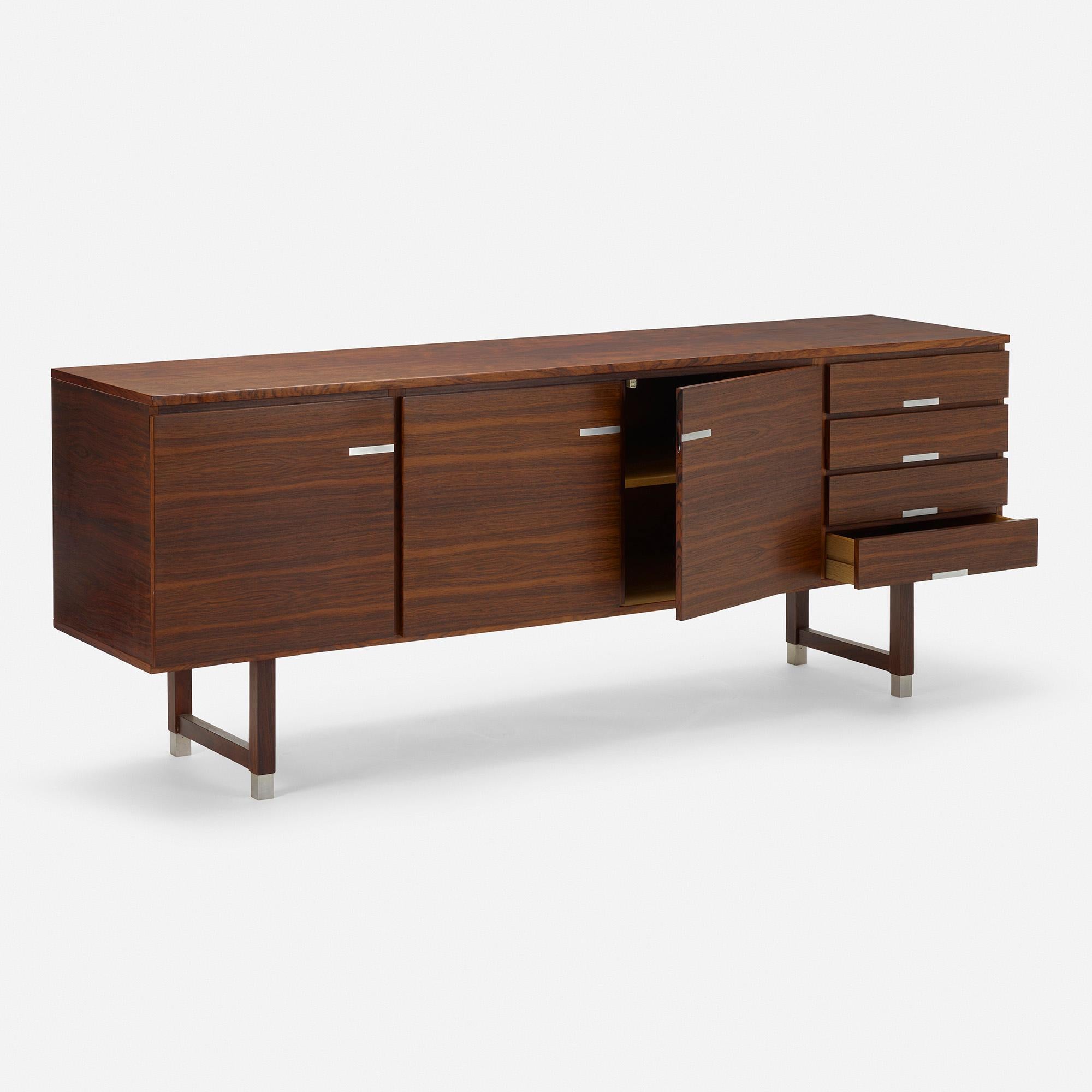 Made in: Denmark, 1958

Material: rosewood, aluminum

Size: 82.75 W × 20 D × 32.5 H in.