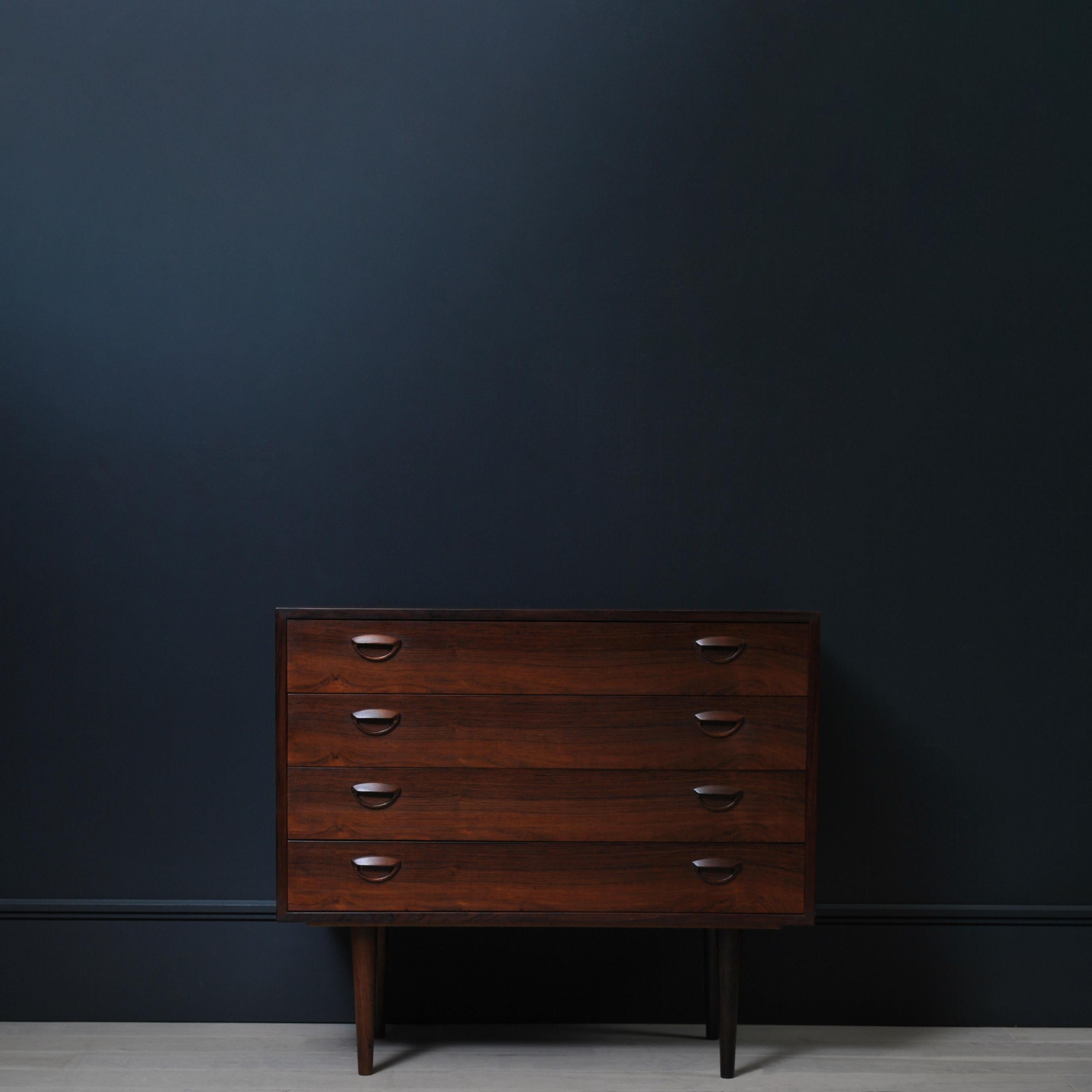 Wonderful original chest of drawers by Kai Kristiansen for Feldballes Mobelfabrik, Denmark circa 1960. Great visual and practical design.
 