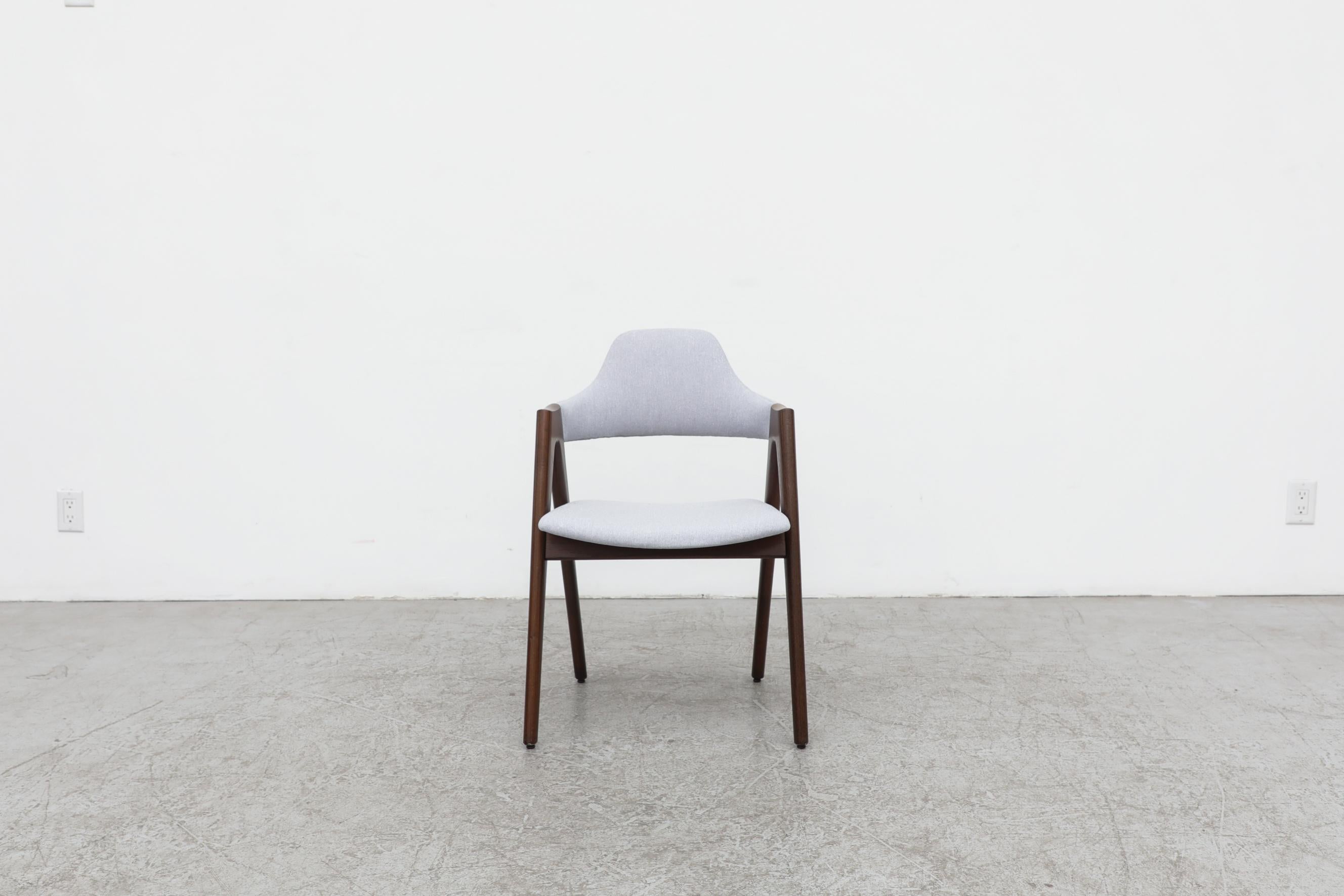 Single Kai Kristiansen Compass chair with light blue upholstery. The Compass Dining Chair / Kompas was designed in 1958 by Kai Kristiansen for SVA Møbler and manufactured in Denmark. In original condition with visible scuffs and chips, particularly