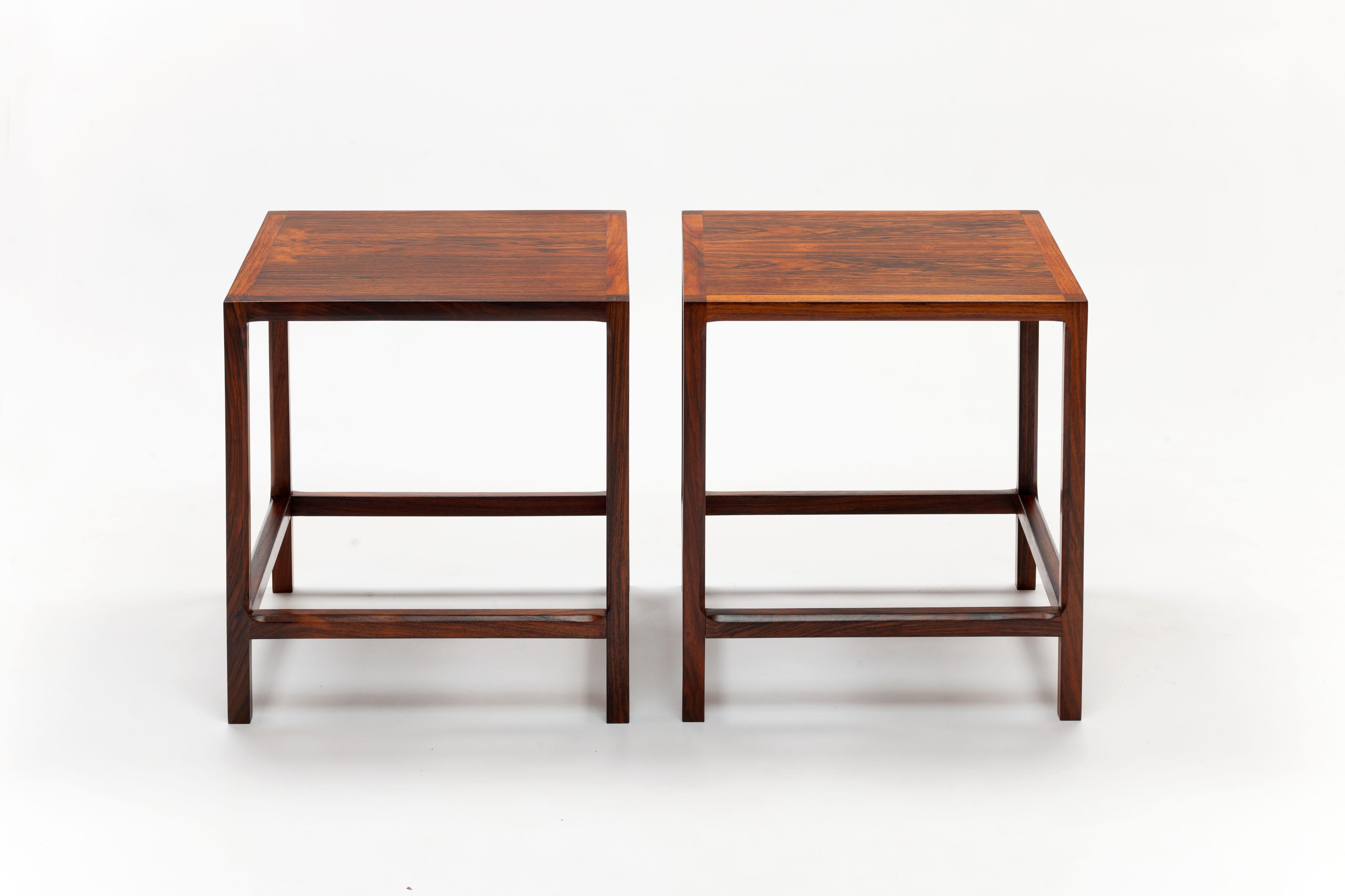High end rosewood tables by Danish designer Kai Kristiansen executed by Aksel Kjersgaard carpentery Denmark, early 1960s.
These tables are of distinctive quality due to the use of solid rosewood.
The design is characterized by the subtle slanting