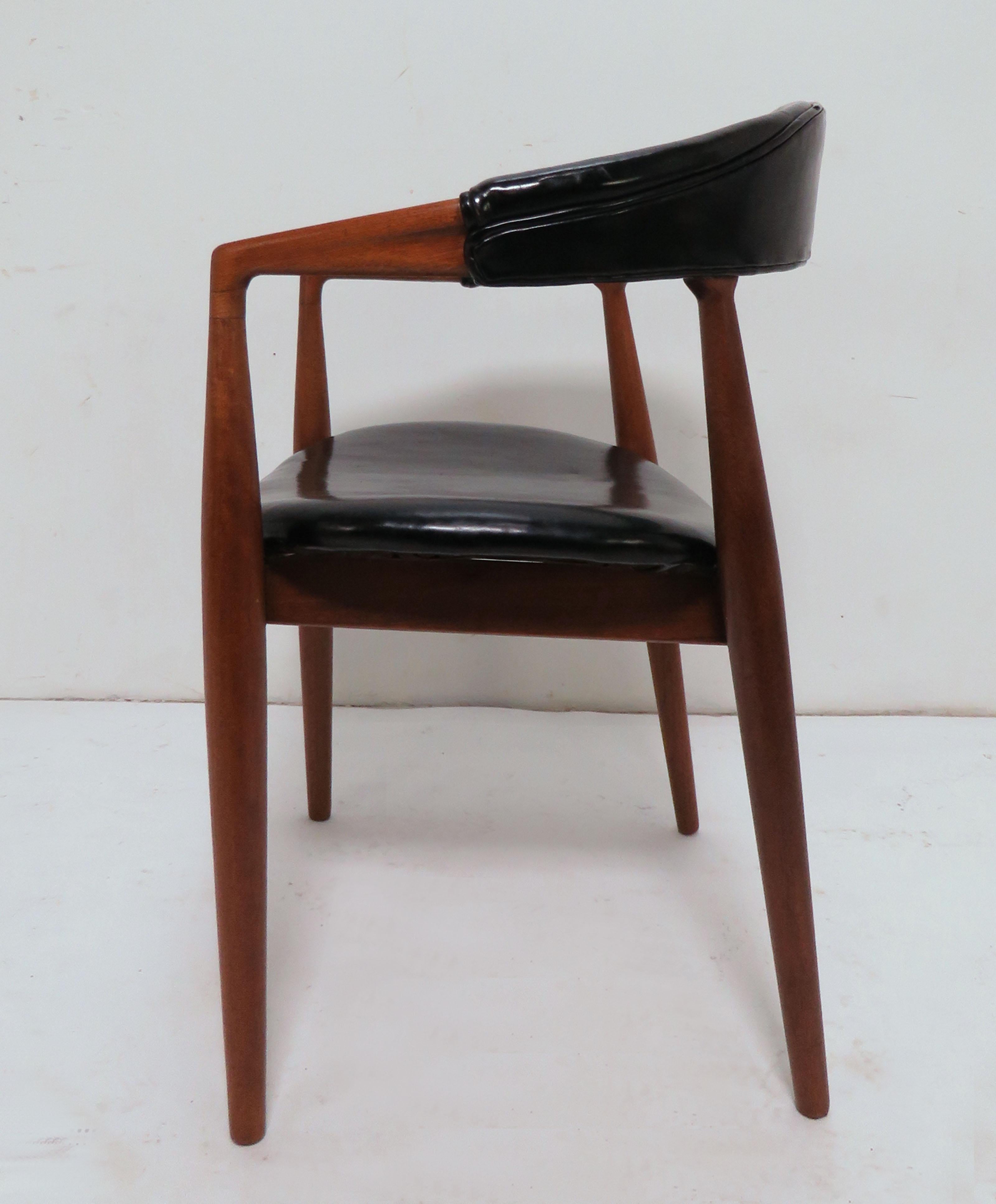 Teak armchair with original leather upholstery designed by Kai Kristiansen in 1958 for Feldballes Mobelfabrik, Model No. 61. Made in Denmark, imported to the United States by George Tanier, Inc.