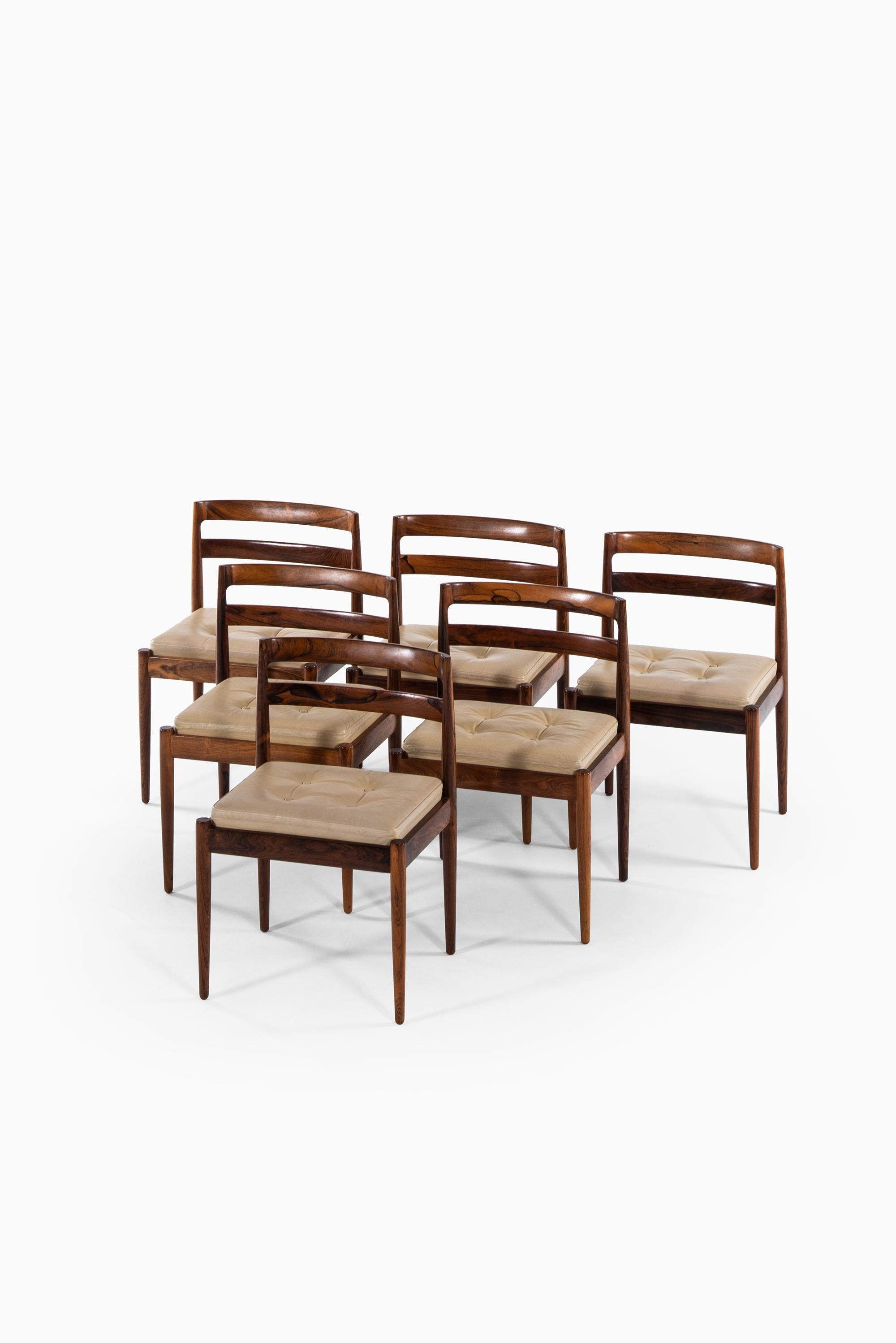 Rare set of 6 dining chairs model 301 / Universe designed by Kai Kristiansen. Produced by Magnus Olesen in Denmark.