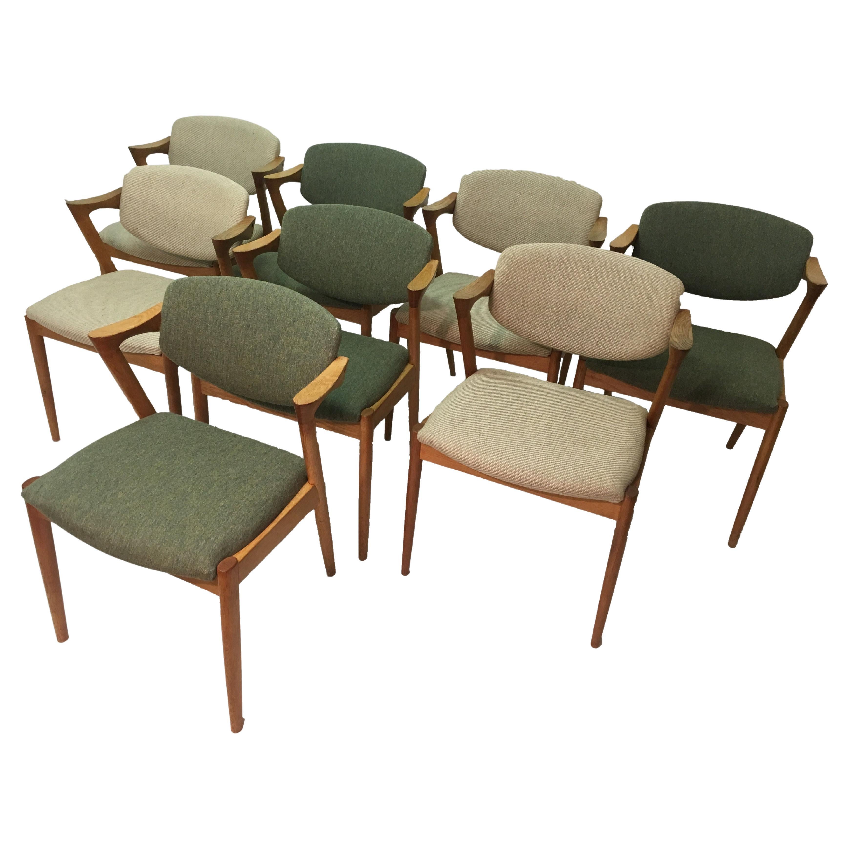 Kai Kristiansen Eight Restored Oak Dining Chairs, Including Custom Reupholstery For Sale