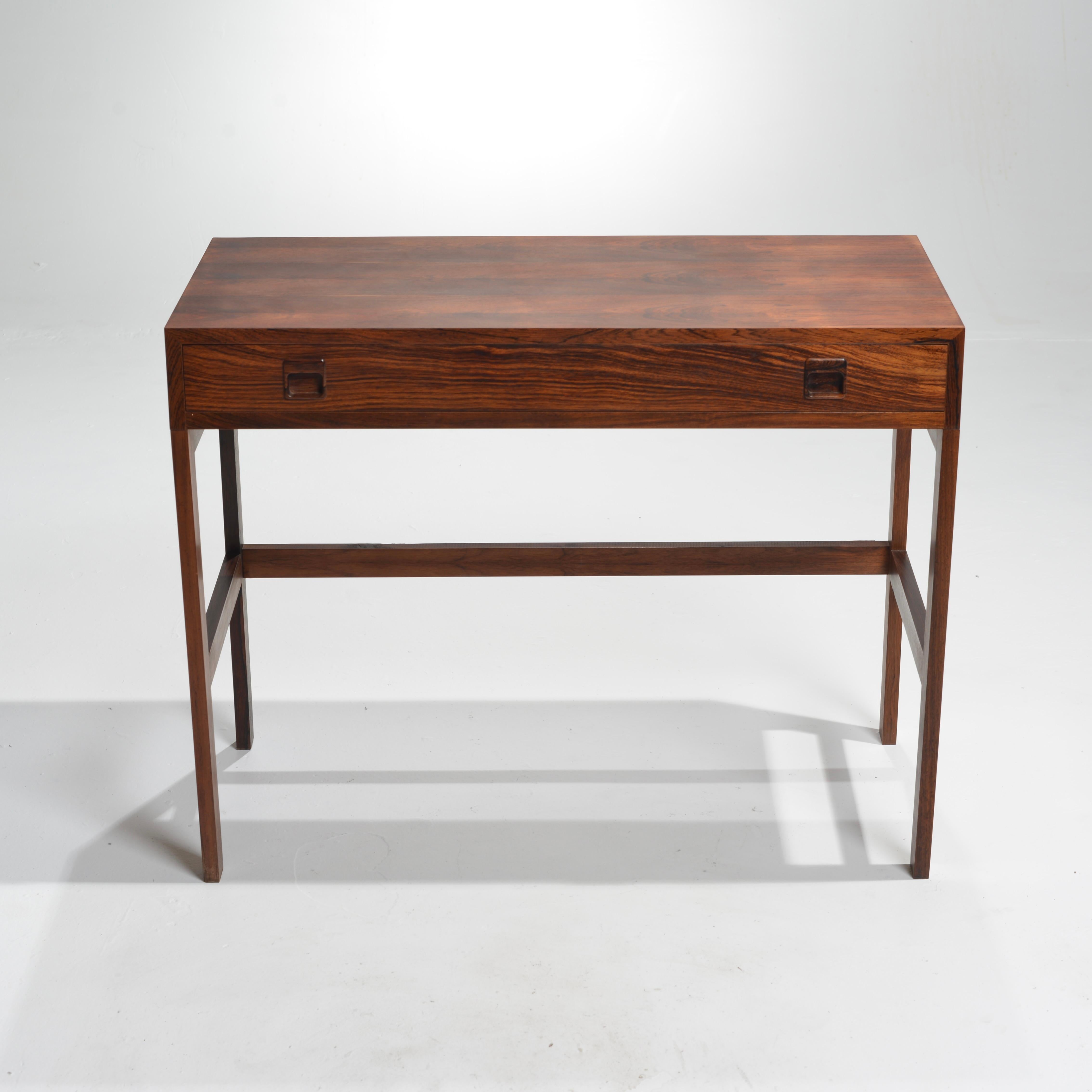 Rare writing table attributed to Kai Kristiansen for Aksel Kjersgaard. 
Great condition with newly restored rosewood. 
 