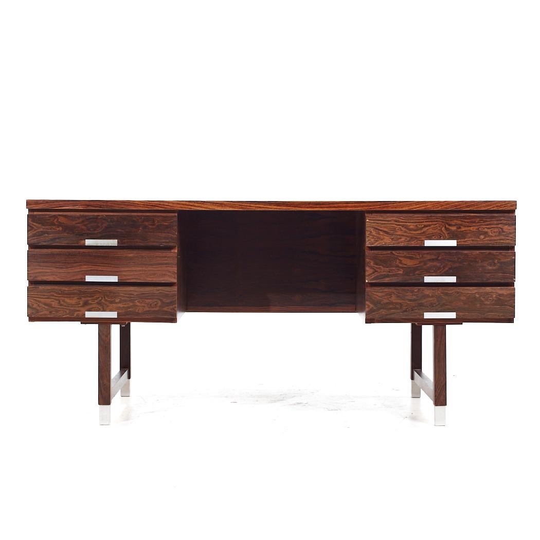 Kai Kristiansen for Feldballes Model EP 401 Mid Century Danish Rosewood Executive Desk

This desk measures: 61 wide x 29.5 deep x 28.5 high, with a chair clearance of 27 inches

All pieces of furniture can be had in what we call restored vintage