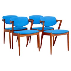 Kai Kristiansen for Schou Andersen Danish Teak Model #42 Set of 4 Dining Chairs Kai Kristiansen for Schou Andersen Danish Teak Model #42 Set of 4 Dining Chairs