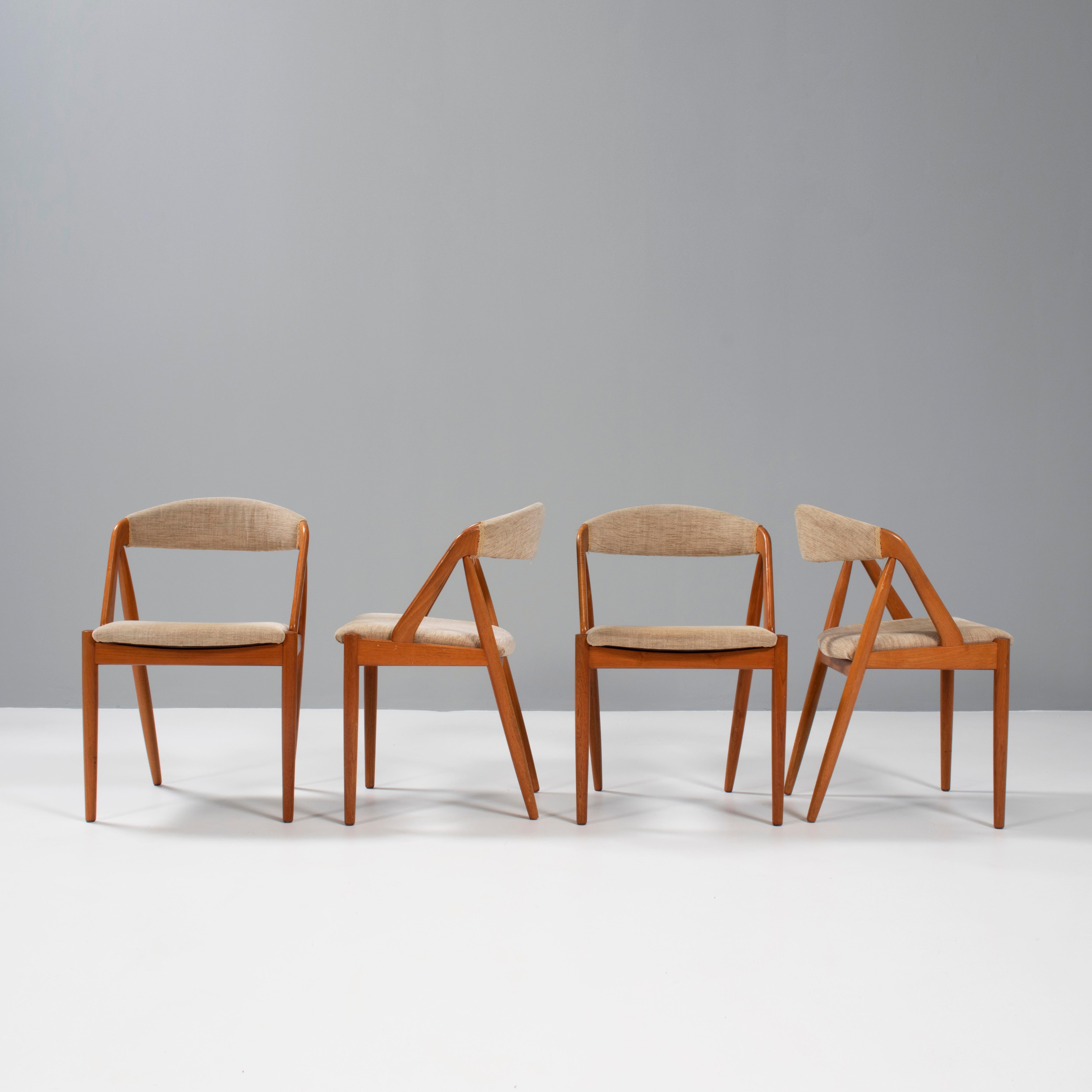 Designed by Kai Kristiansen for Schou Andersen the Model 31 dining chair is a fantastic example of classic Danish Mid-Century design.

Constructed from teak, the chairs have a classic silhouette combining a curved backrest with angled legs and arm