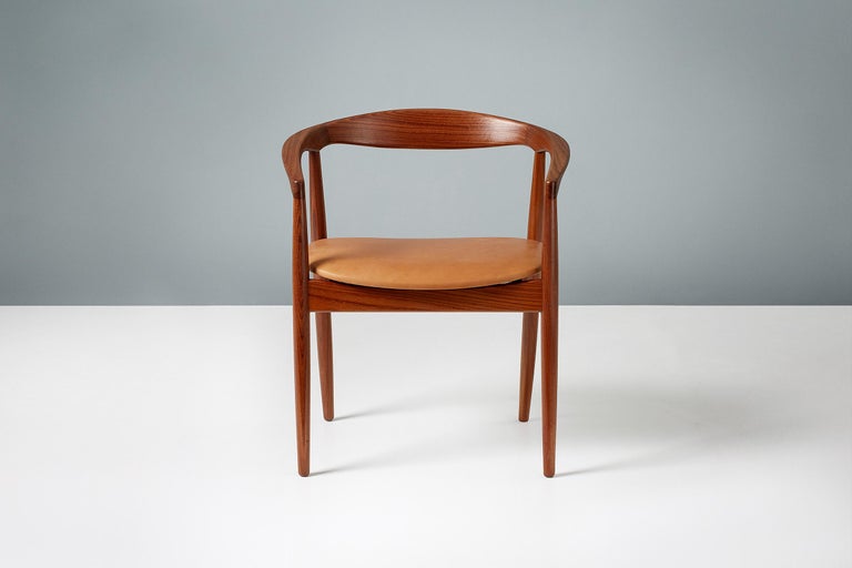Kai Kristiansen 'Troja' round chair from circa 1960. The frame is made from Afromosia African teak wood. The seat has been reupholstered in premium aniline cognac brown leather.