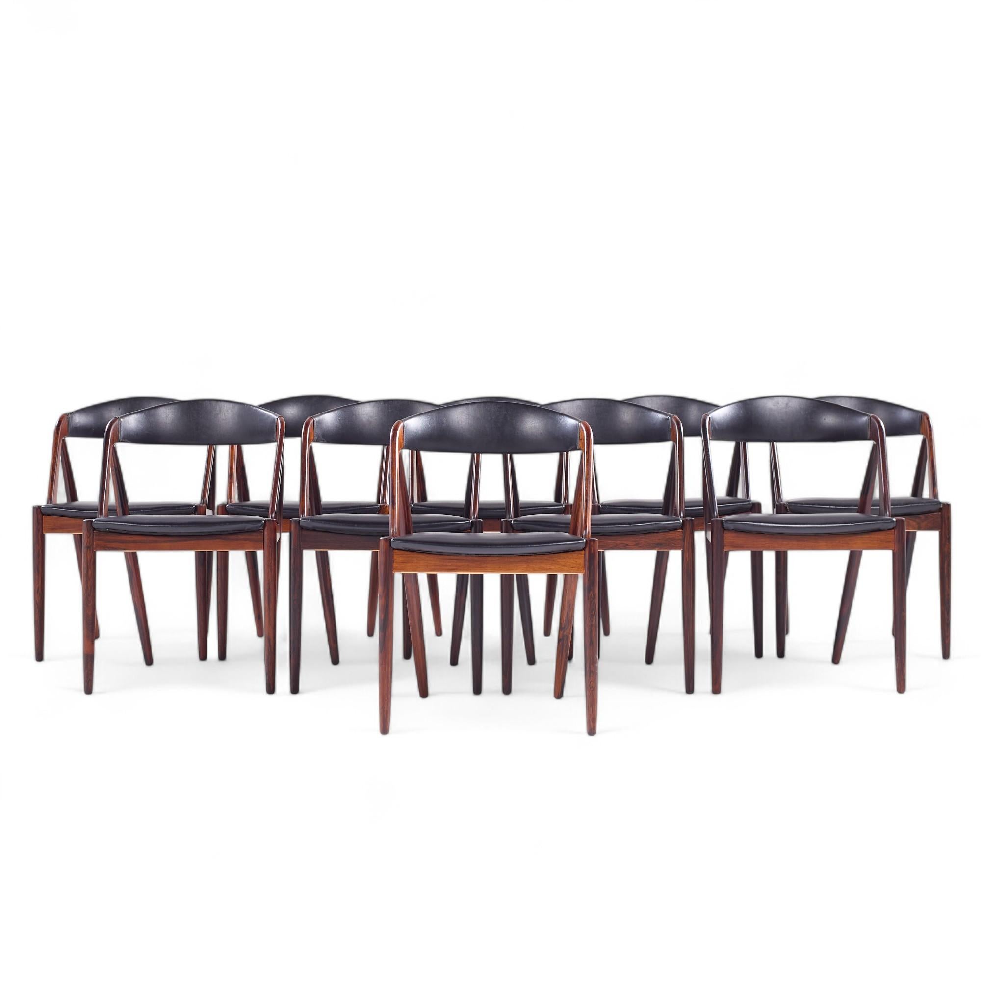 Kai Kristiansen Mid Century Danish Rosewood Dining Chairs - Set of 10

Each chair measures: 19.5 wide x 20 deep x 29.5 inches high, with a seat height/chair clearance of 17.5 inches

All pieces of furniture can be had in what we call restored