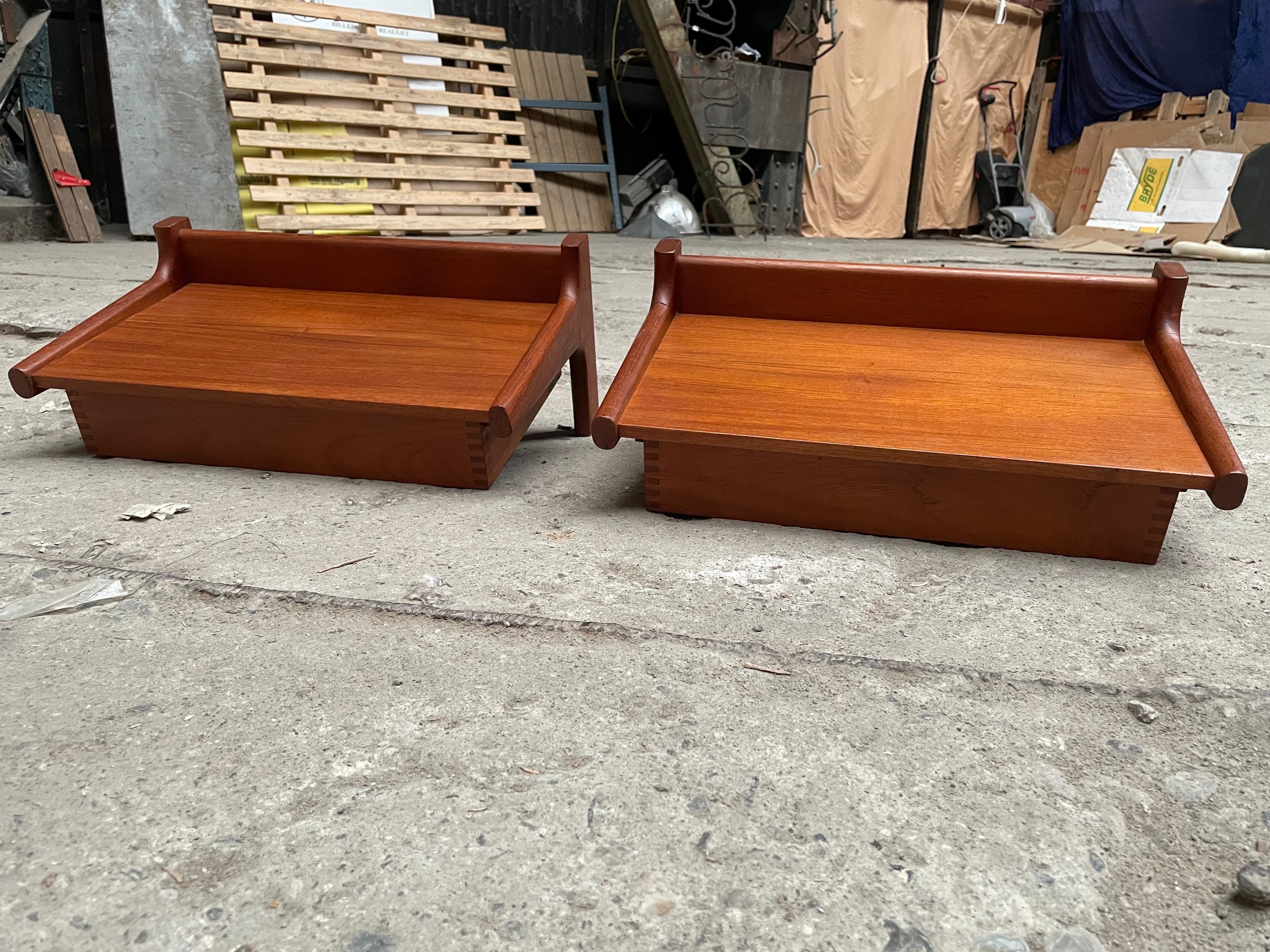 A pair of 1960s teak wall-mounted bedside tables by iconic Danish designer Kai Kristiansen in perfect condition. Meticulously crafted from premium teak. A space-saving design, uniting practicality and elegance in a single drawer, ensuring an