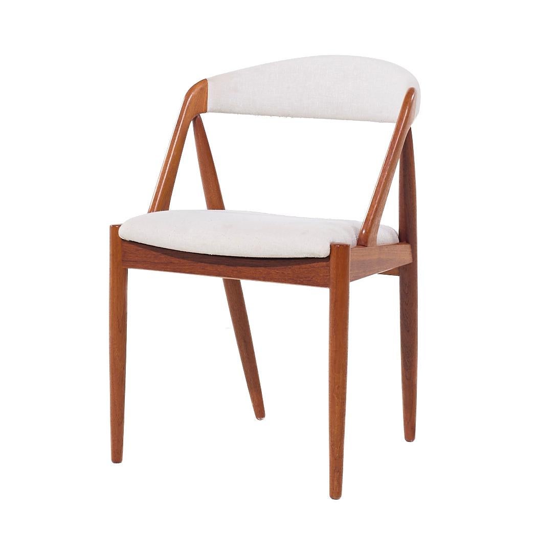 Kai Kristiansen Modelo 31 Sillas de comedor danesas de teca de mediados de siglo - Juego de 6 finales del siglo XX en venta