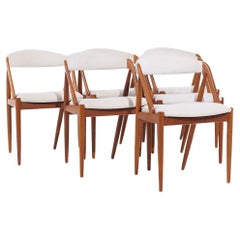Kai Kristiansen Modelo 31 Sillas de comedor danesas de teca de mediados de siglo - Juego de 6