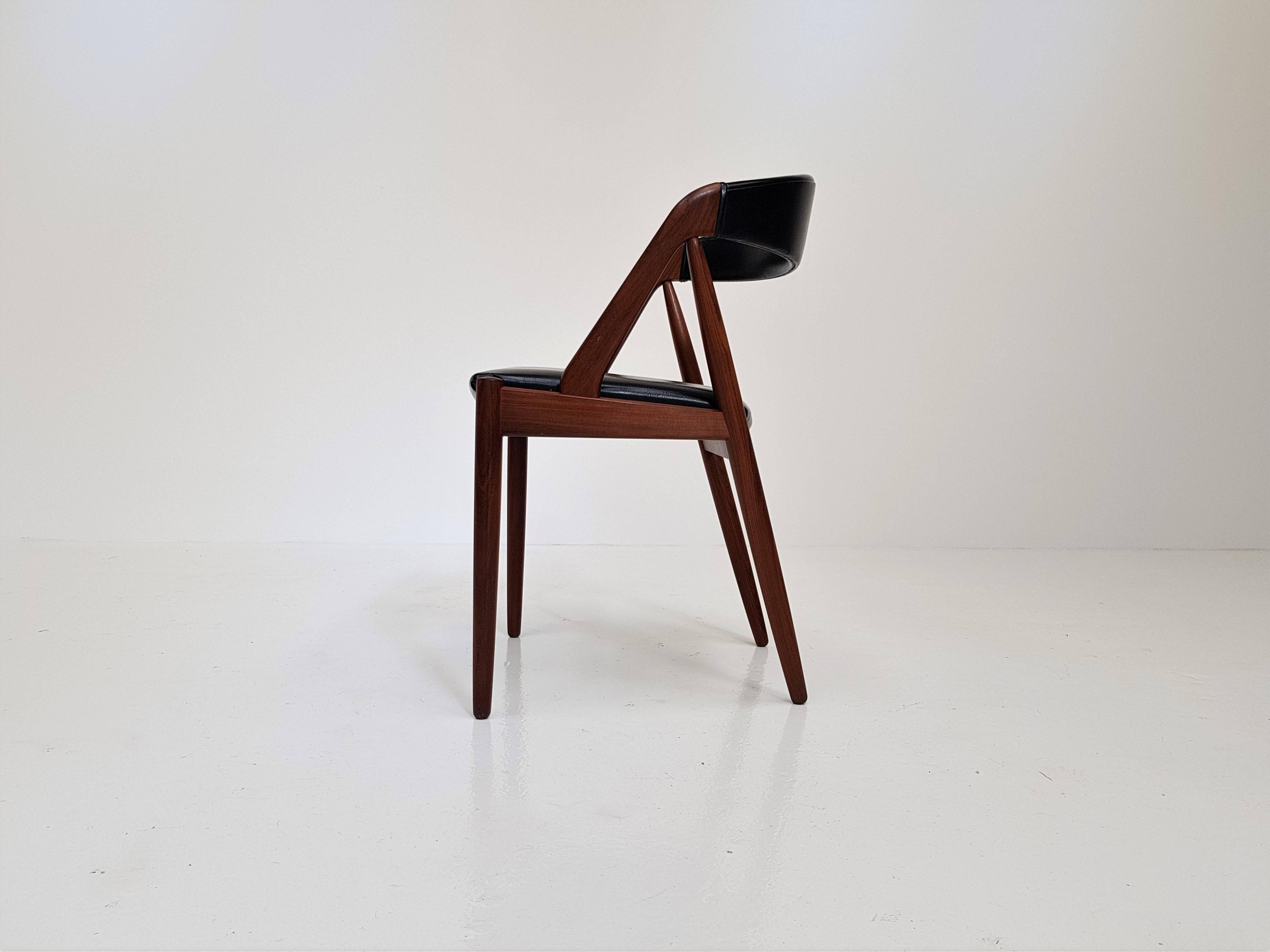 A Kai Kristiansen model 31 teak 'A' frame dining chair for Schou Andersen, 1960s.

Amazing Kai Kristiansen model 31 teak 'A' frame dining chair for Schou Andersen 1960s, original faux black leather upholstery.

 