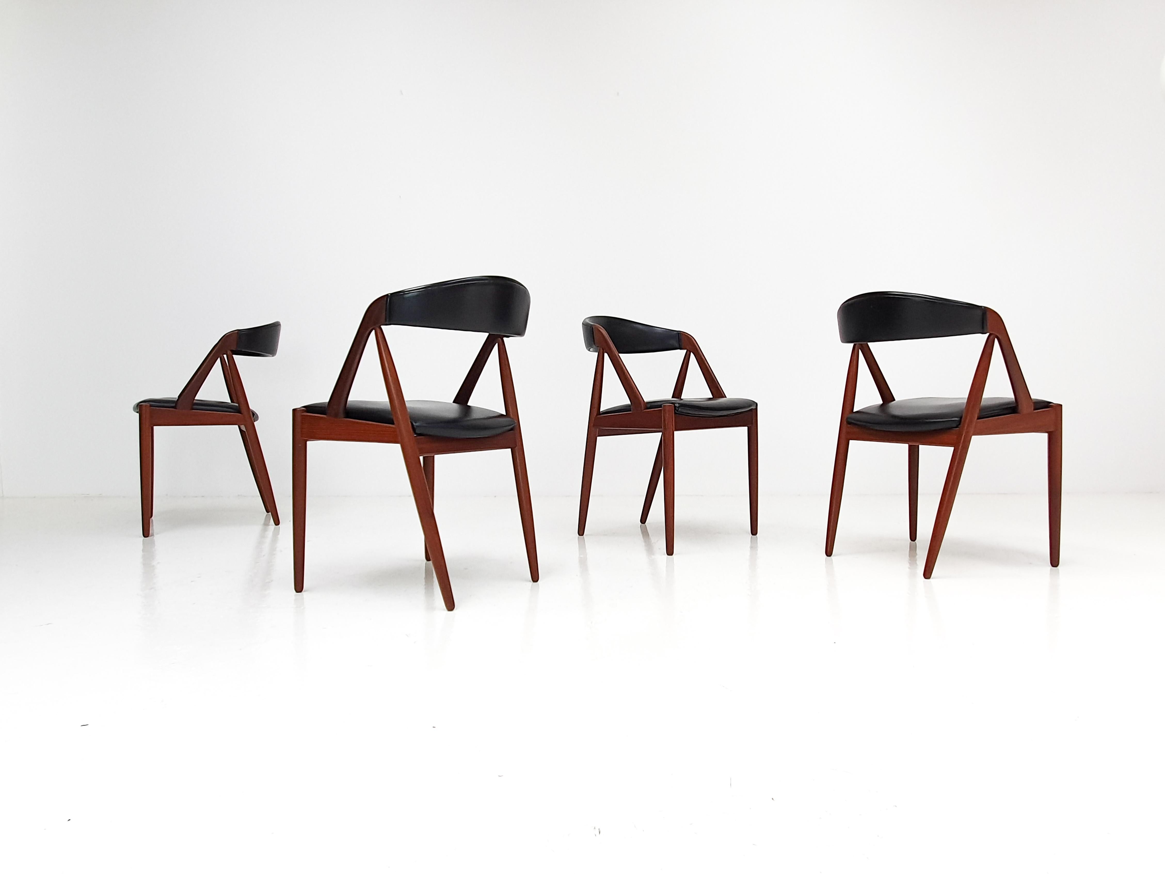 A set of four Kai Kristiansen model 31 teak 'A' frame dining chair for Schou Andersen, 1960s.

Amazing Kai Kristiansen model 31 teak 'A' frame dining chairs for Schou Andersen, 1960s, original faux black leather upholstery.

   