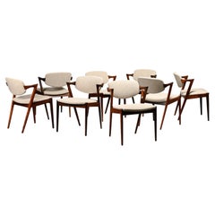 Kai Kristiansen Model 42 Dining Chairs in Rosewood and light fabric Denmark